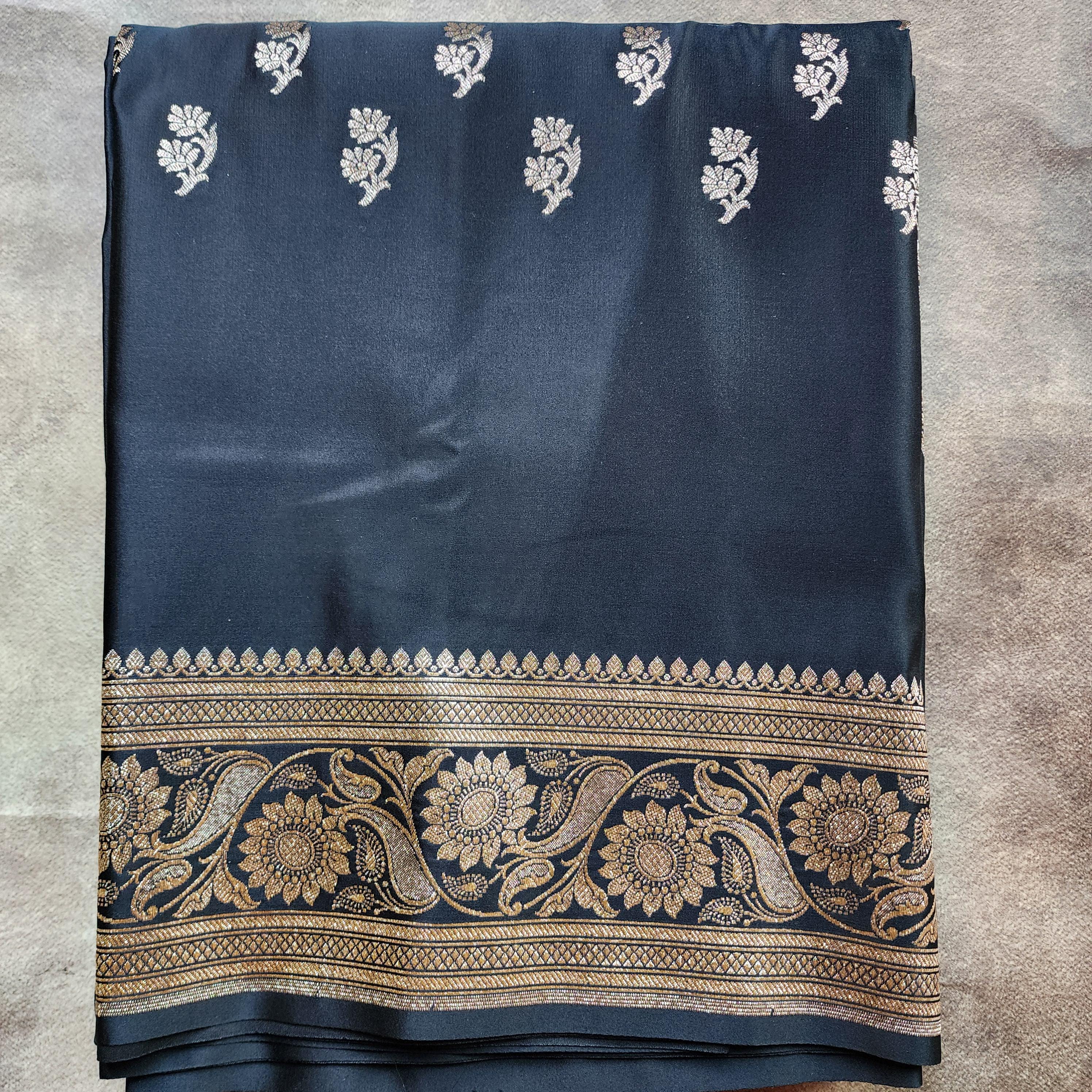 Mighty Black Pure Banarasi Katan Silk Saree with light Gold Zari Weaving