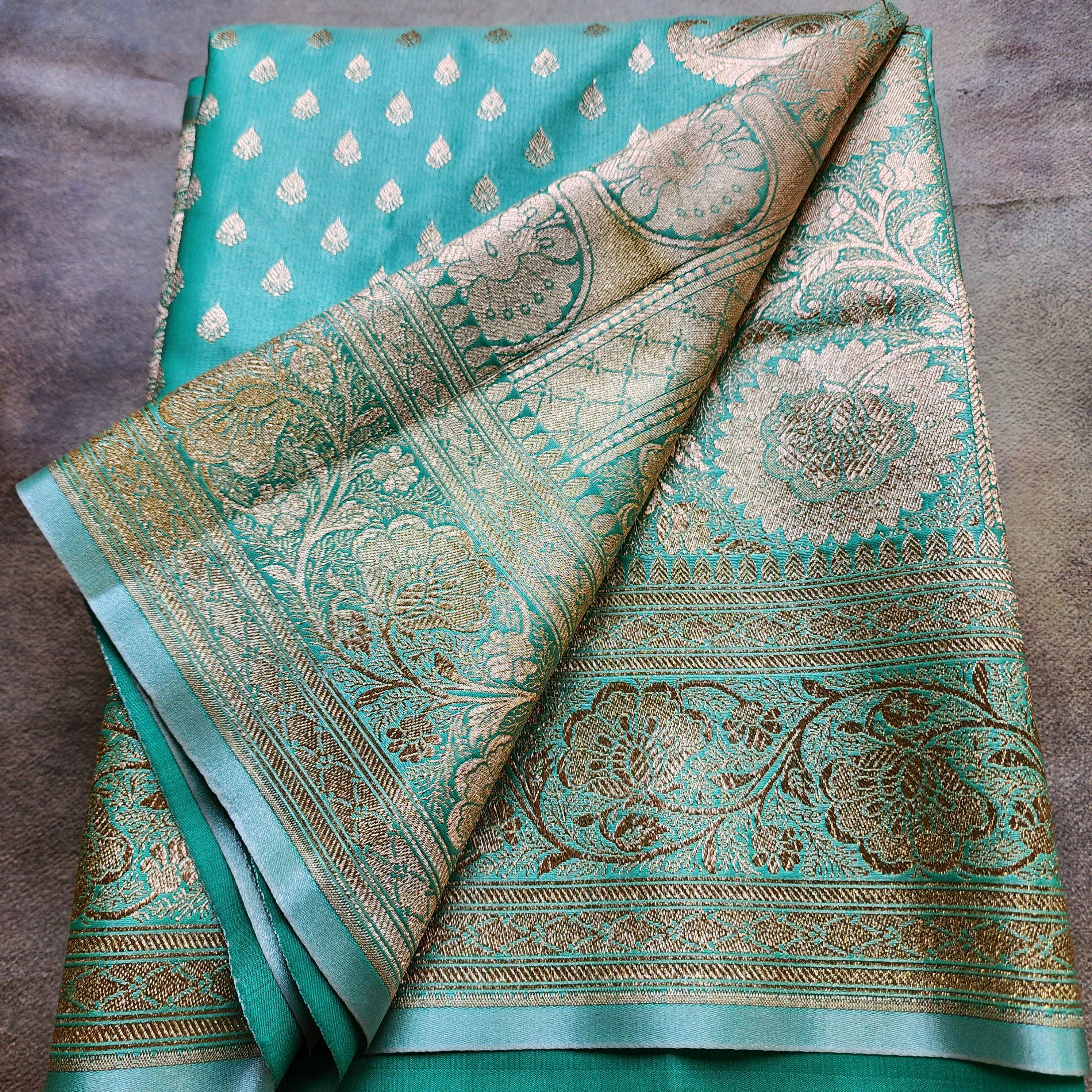 Rich Emerald Green Banarasi Silk Saree with Gold Zari Weaving