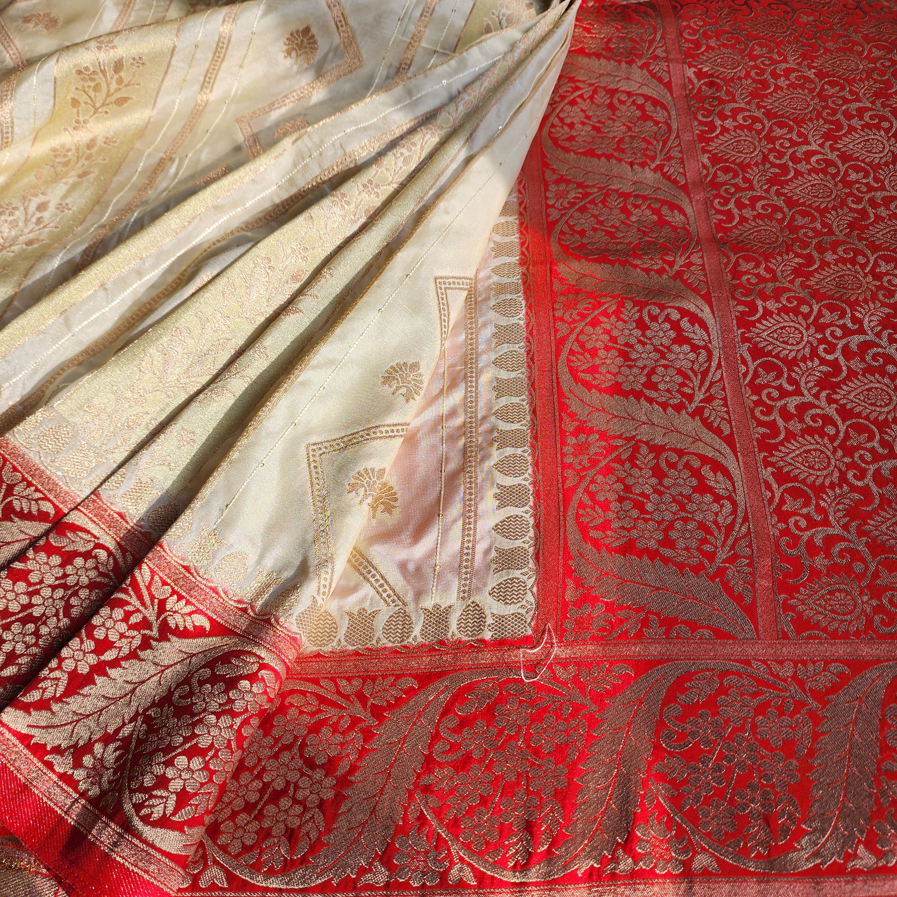 Rich White Crepe Georgette Silk Saree with Red Border and Gold Zari Detailing