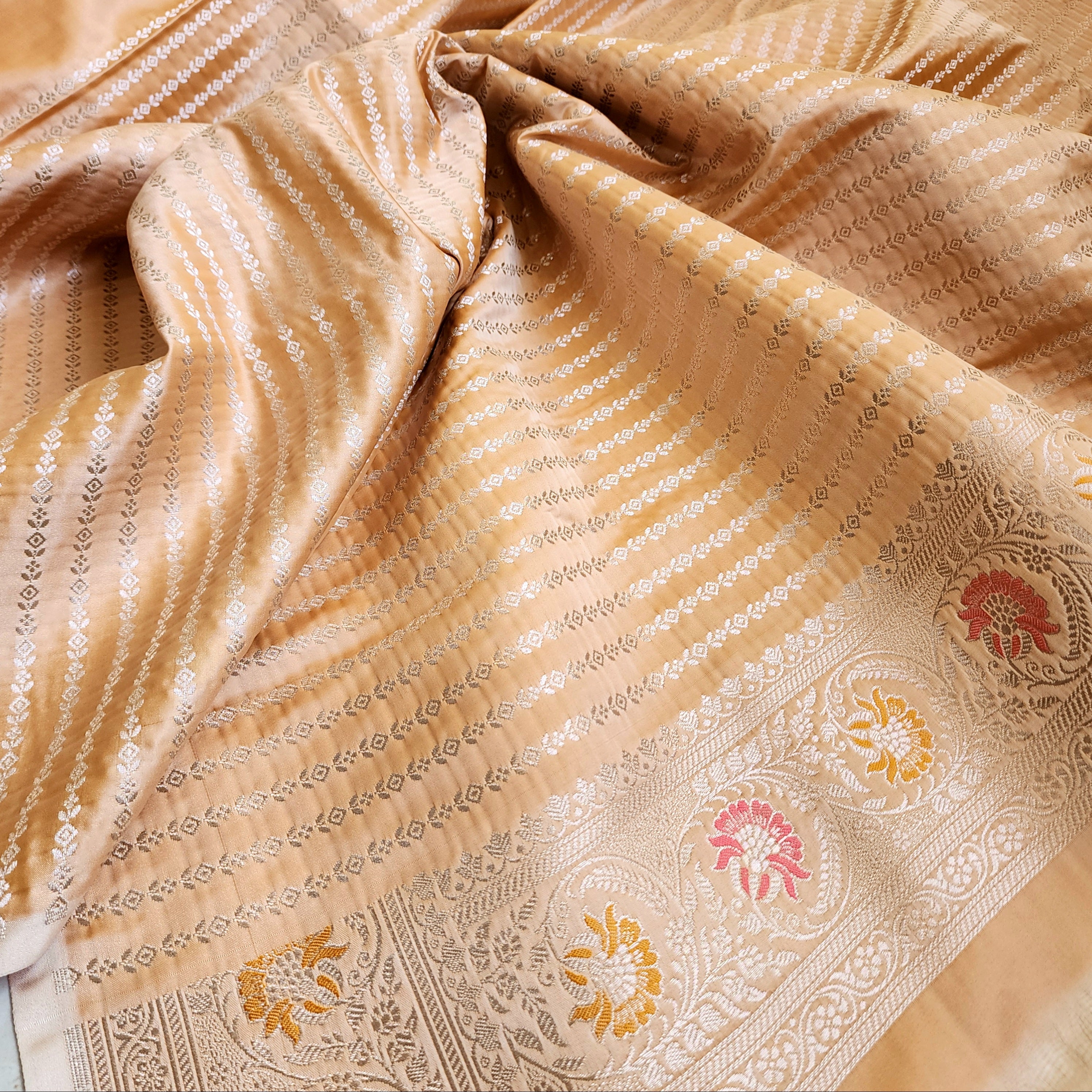 Enriched Dark Orange Banarasi Katan Silk Saree with Multicolor Meenakari Floral Jaal