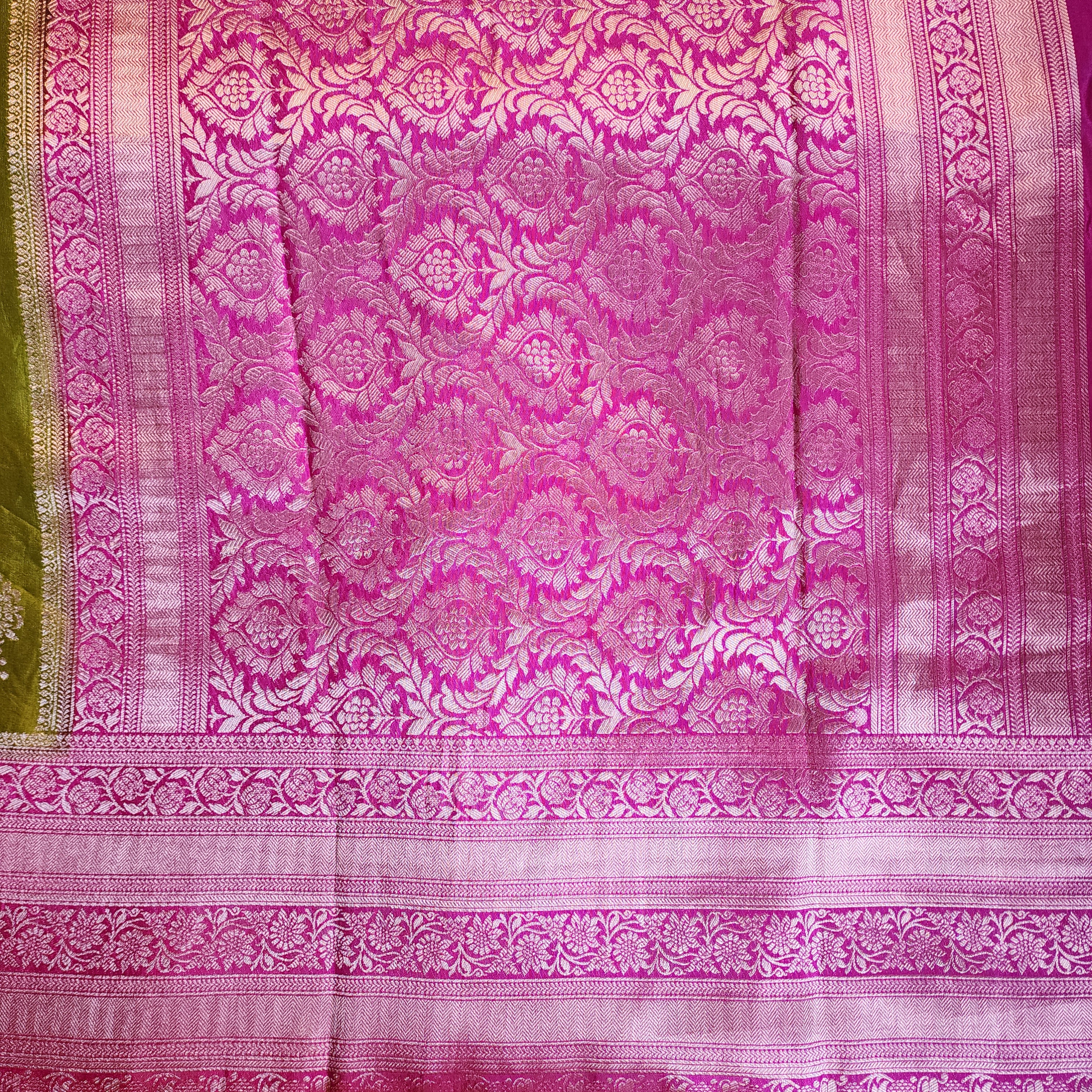 Olive Green Muslin Silk Saree with Traditional Silver Zari Work