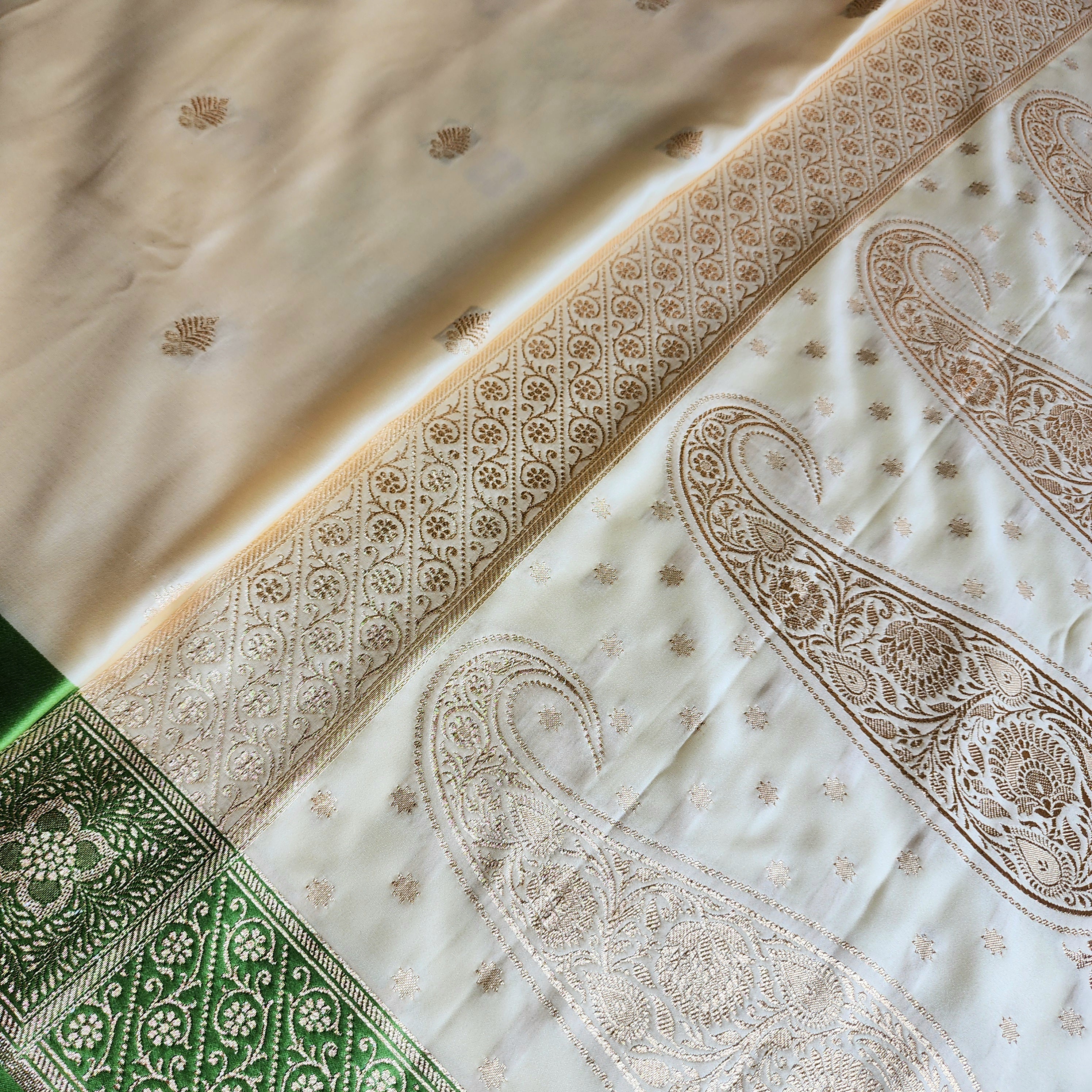 White Katan Silk Saree with Green and Gold Zari Border