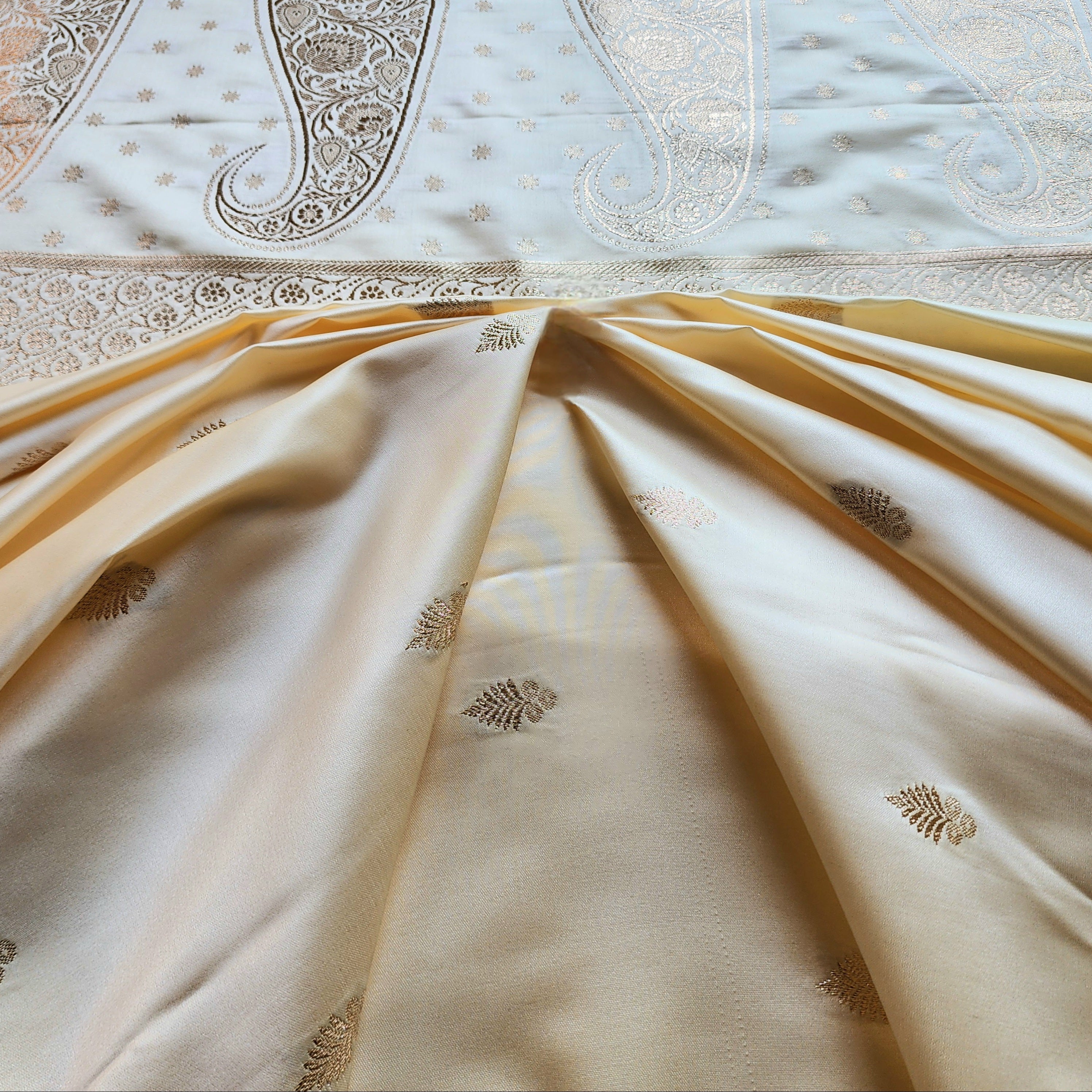 White Katan Silk Saree with Green and Gold Zari Border