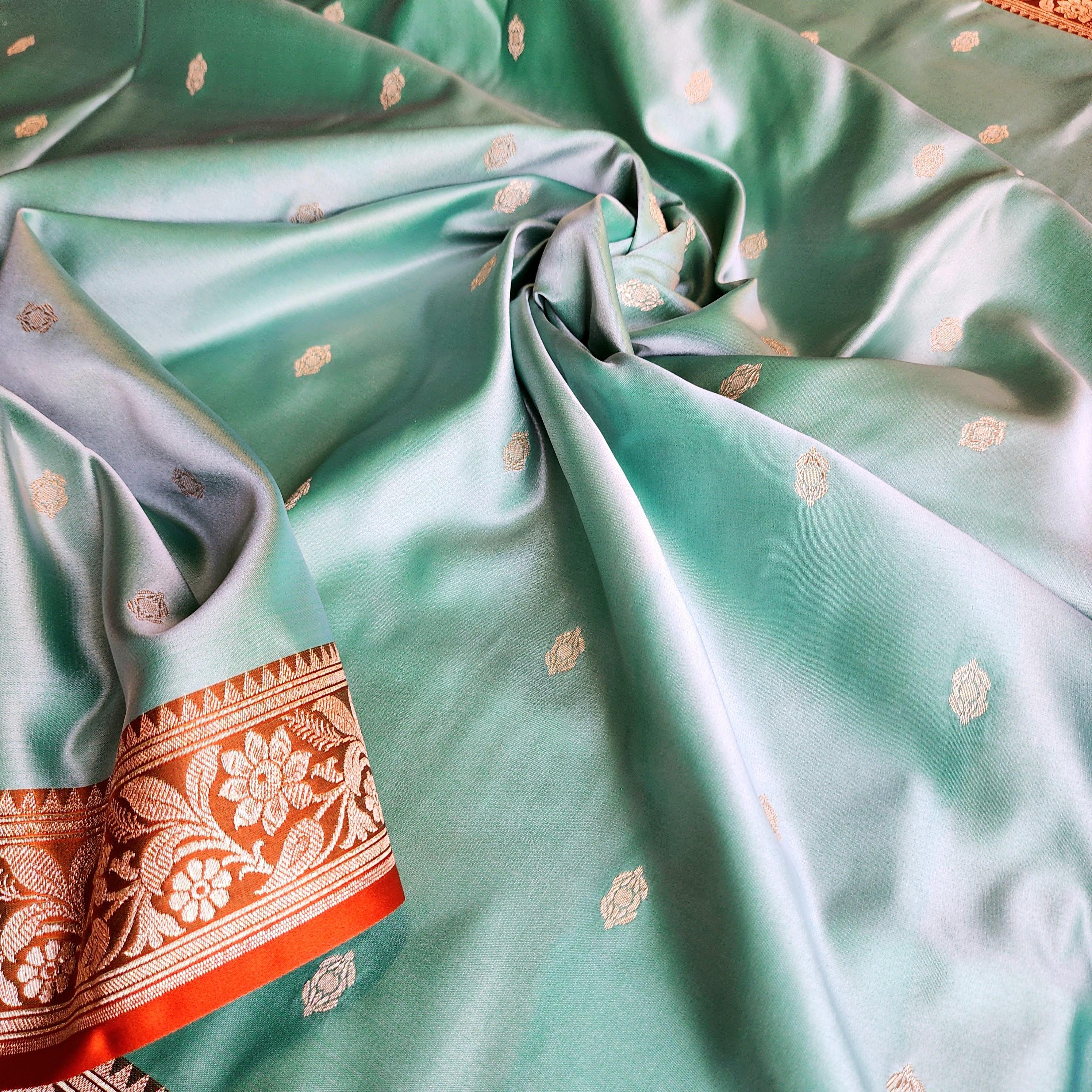 Aqua Katan Silk Saree with Rust and Gold Zari Border