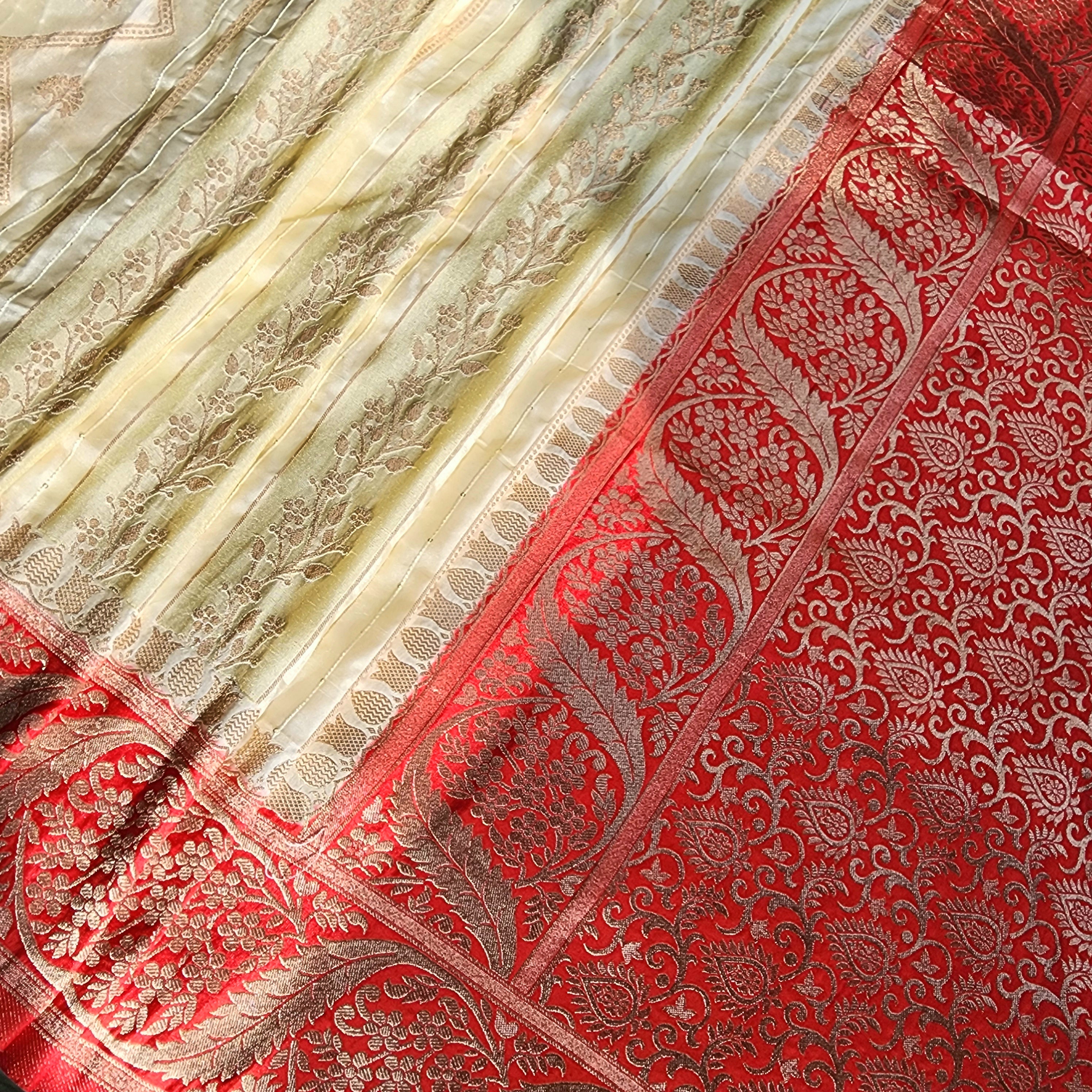 Rich White Crepe Georgette Silk Saree with Red Border and Gold Zari Detailing