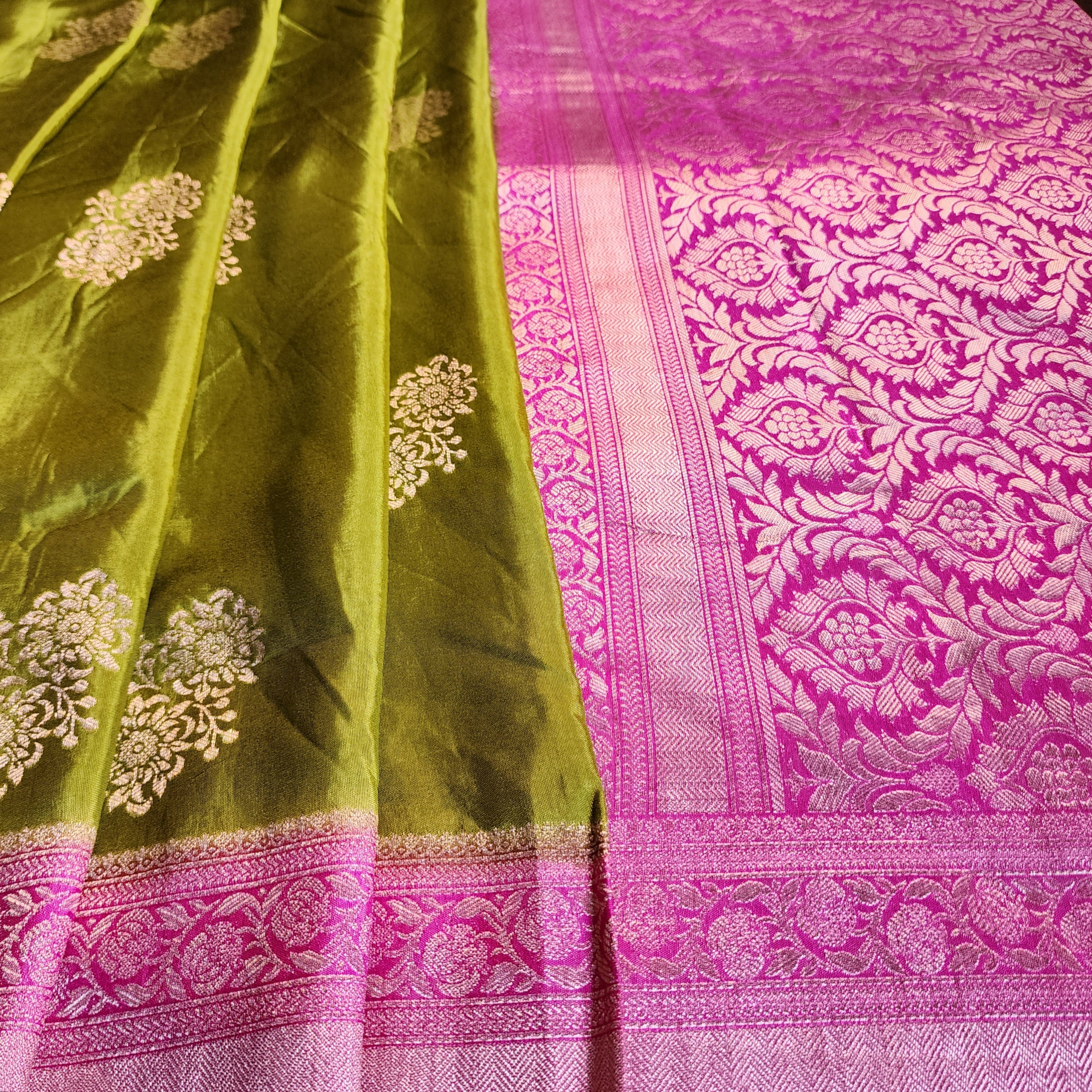 Olive Green Muslin Silk Saree with Traditional Silver Zari Work