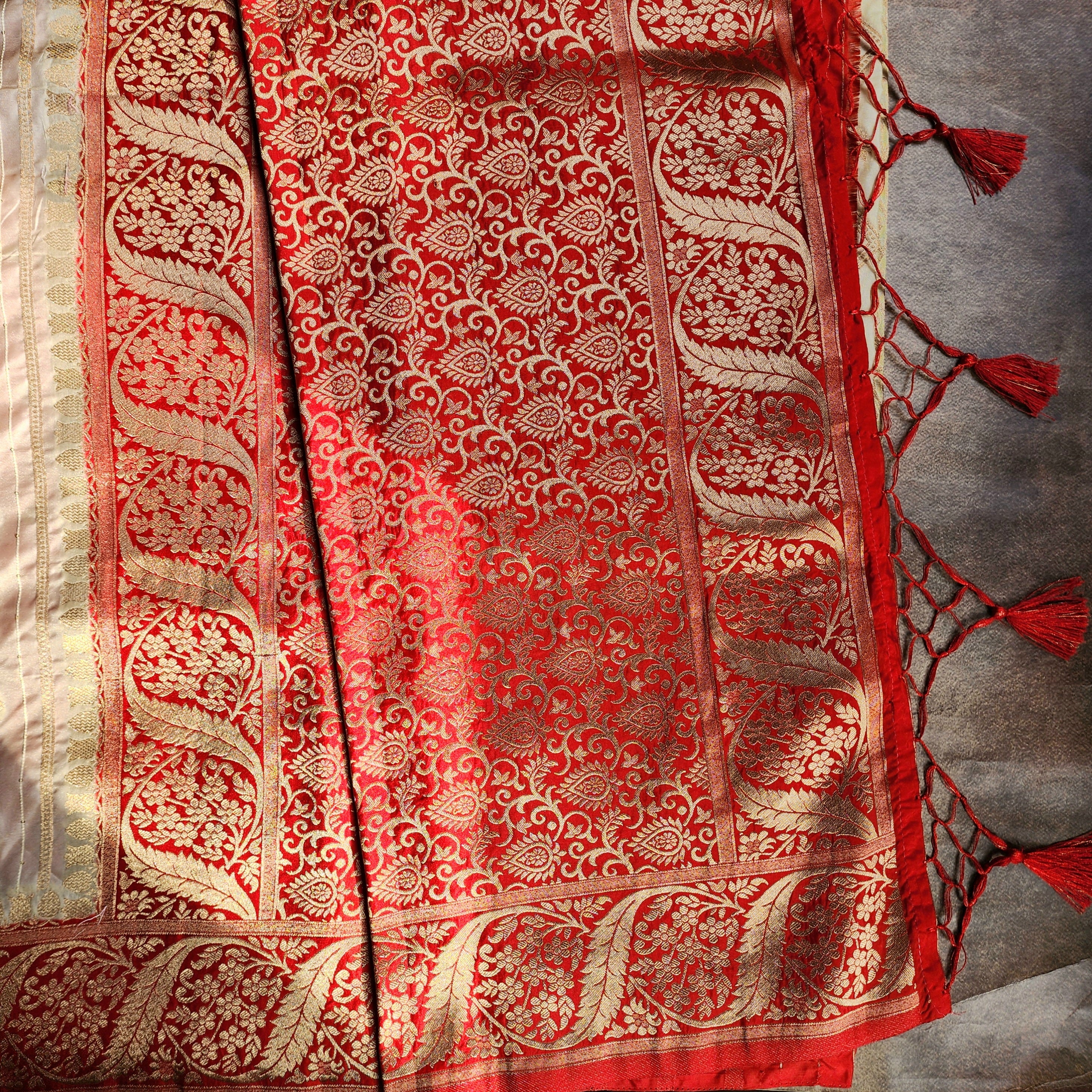 Rich White Silk Saree with Red Border and Gold Zari Detailing