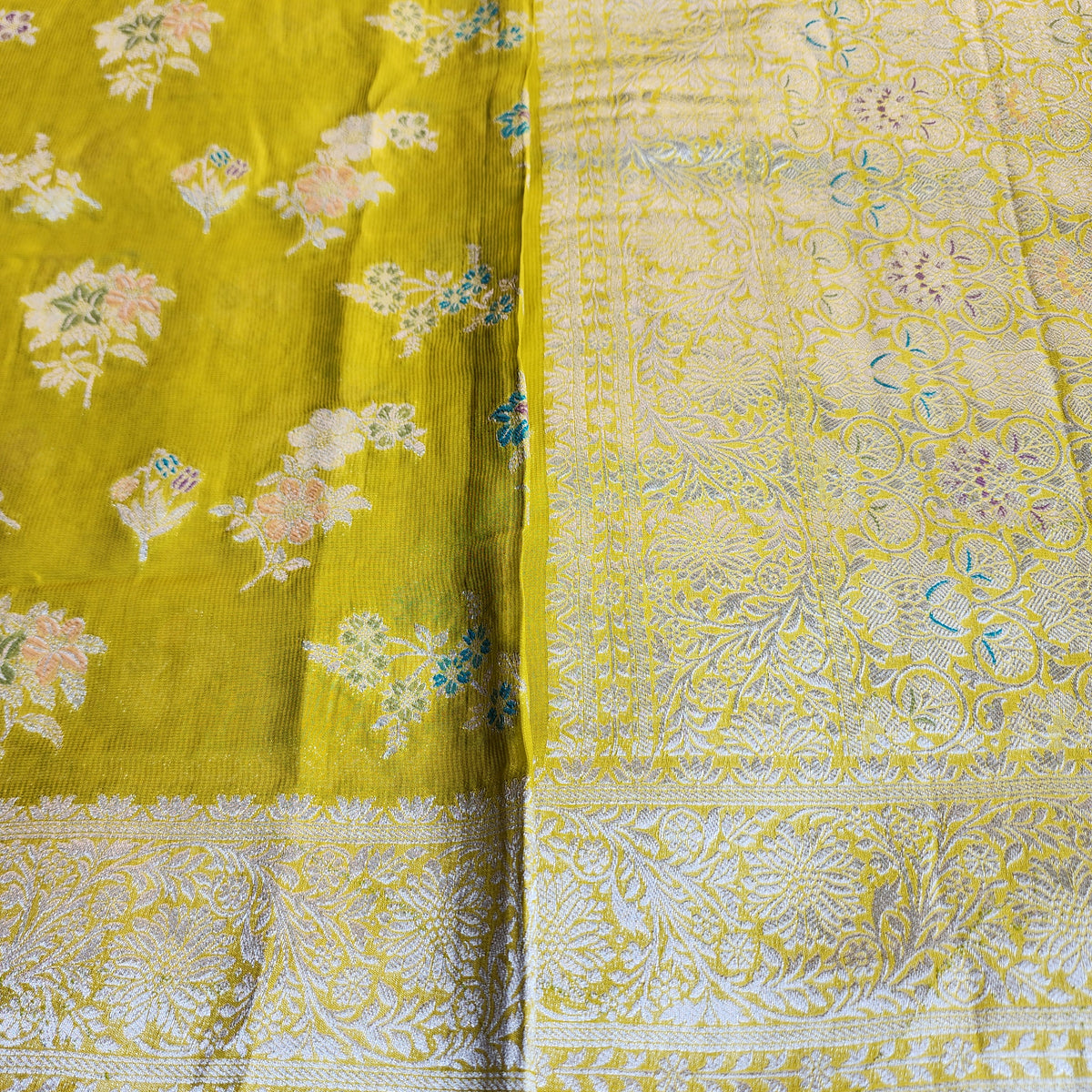 Yellowish Green Muslin Silk Saree with Floral Weave