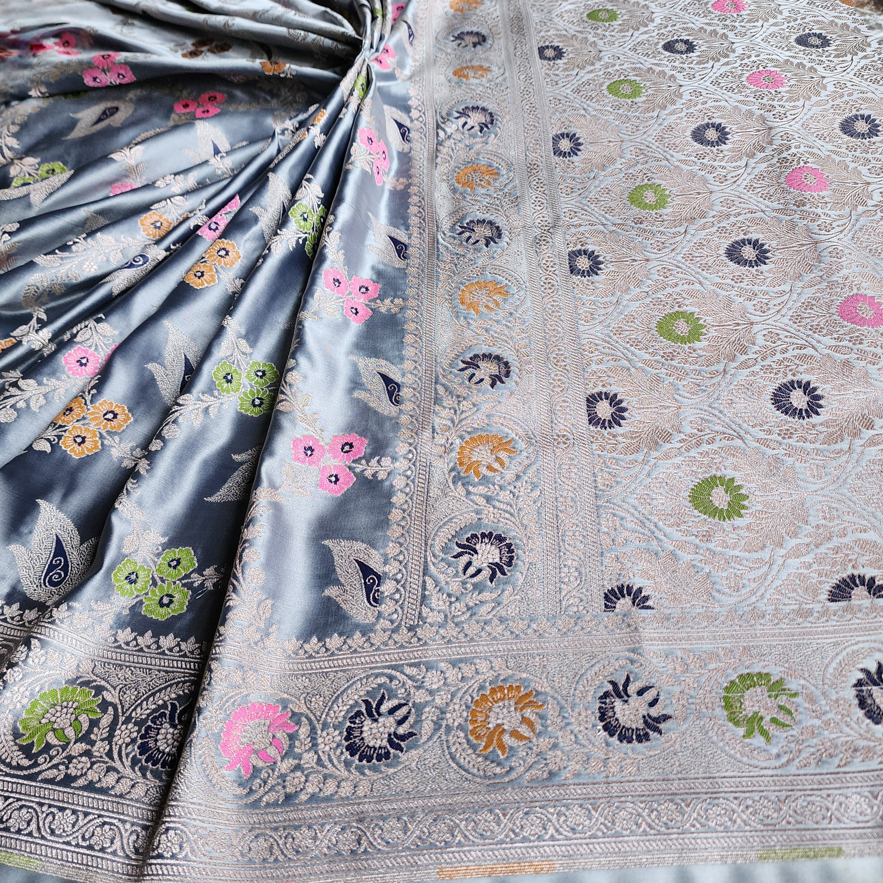 Enriched Dusky Blue Banarasi Katan Silk Saree with Multicolor Meenakari Floral Jaal