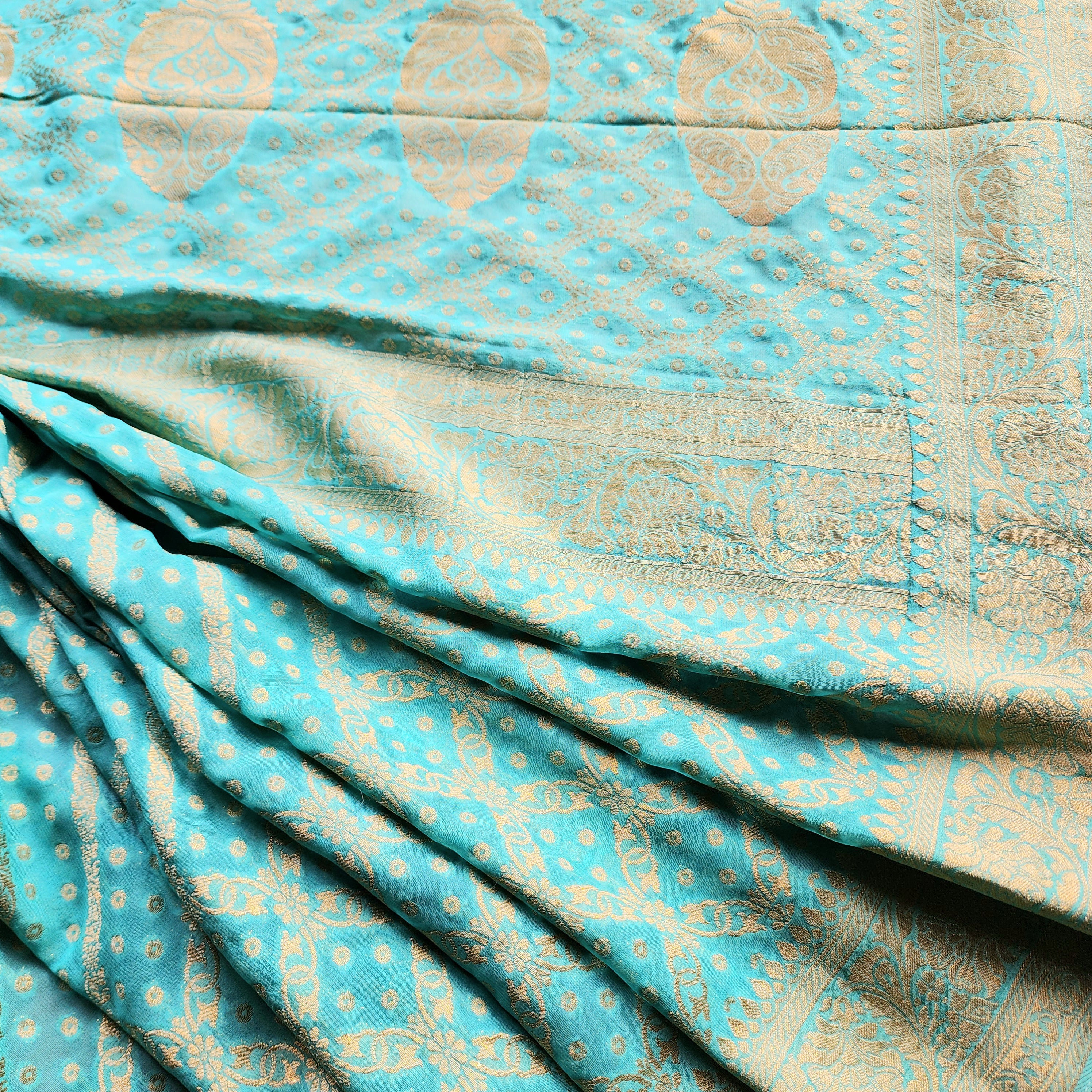 Turquoise Pure Khaddi Georgette Banarasi Saree with Golden Zari