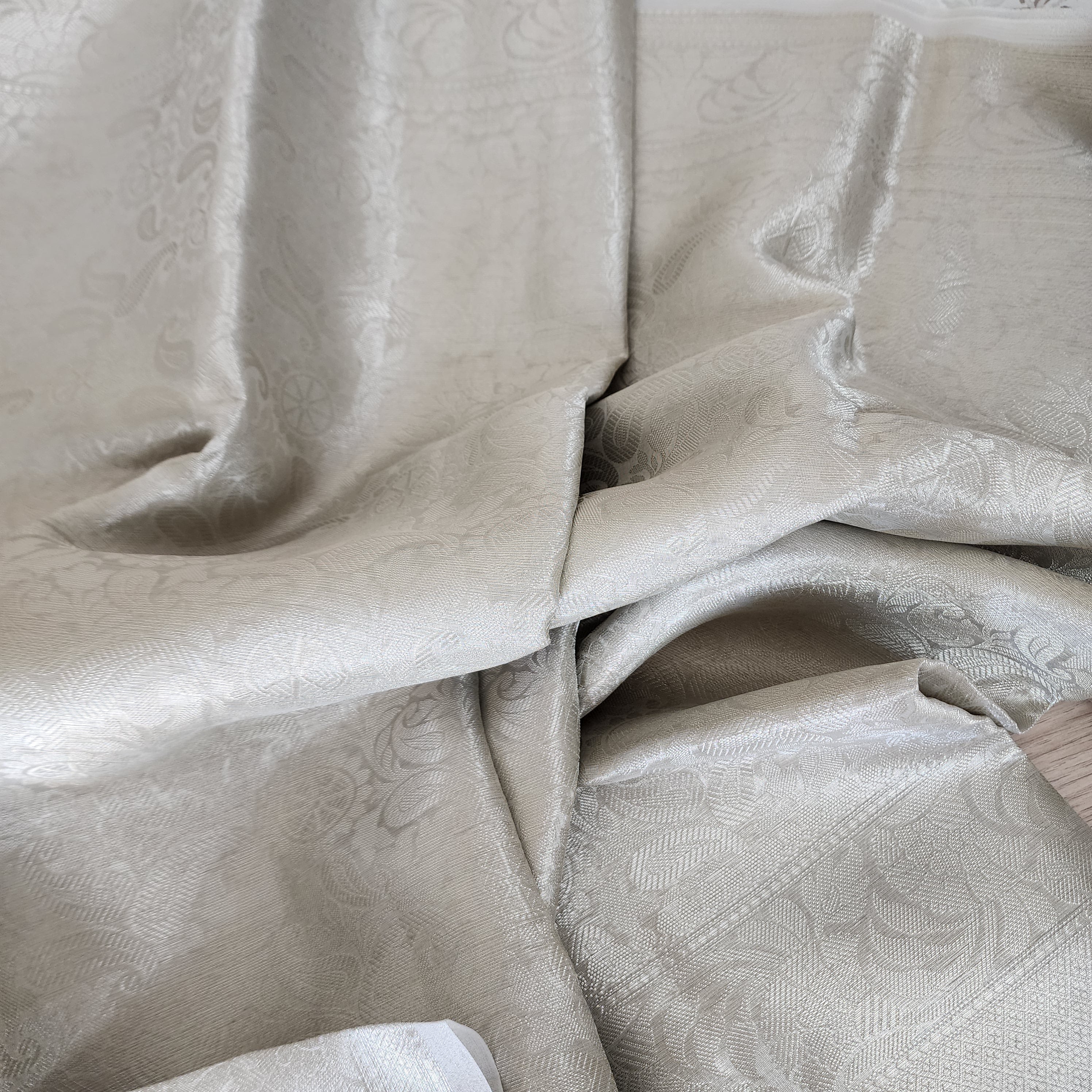 Classic Off-White Water Zari Tissue Sari with tassels