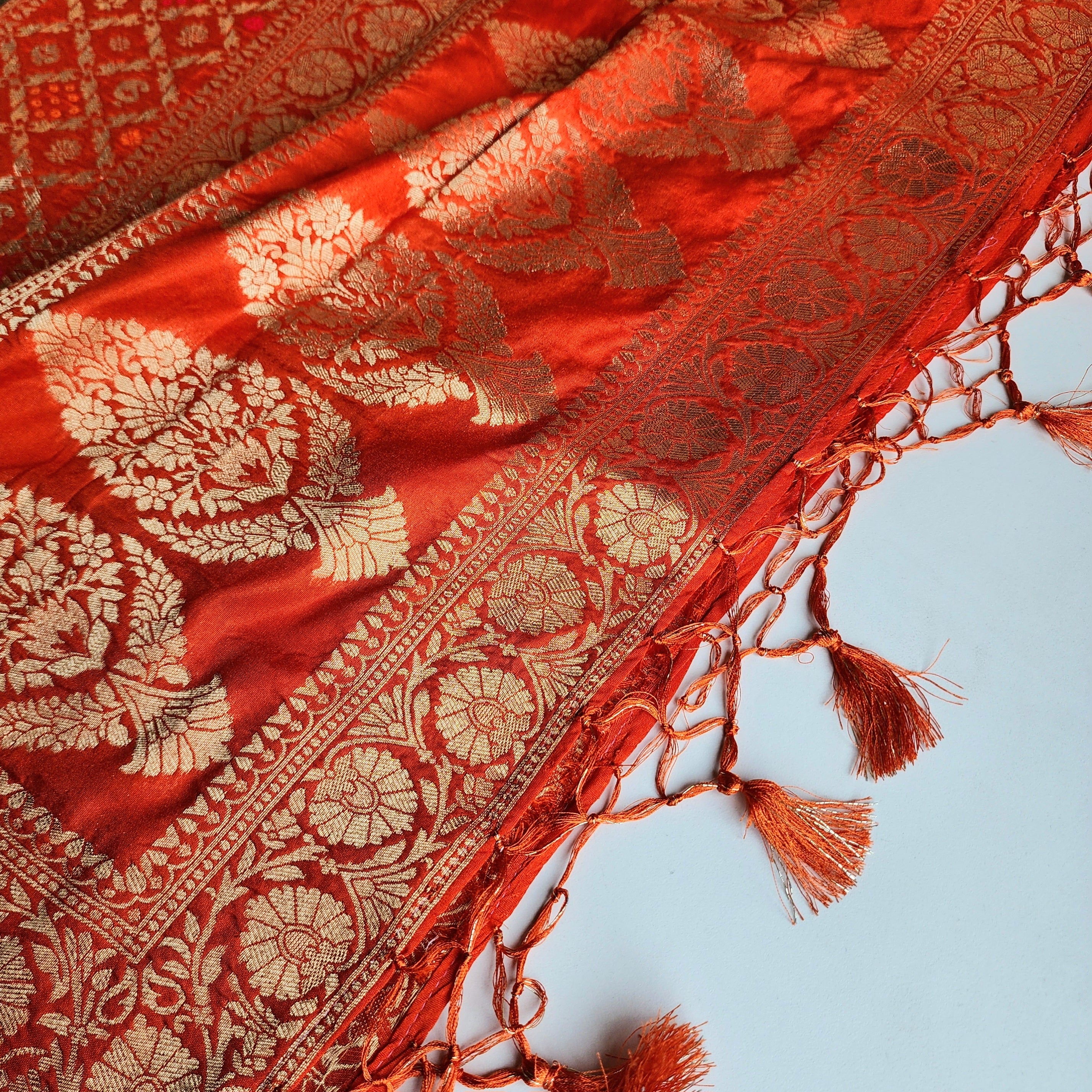 Burnt Orange Bandhani Dupatta with Floral and Geometric Zari Weave