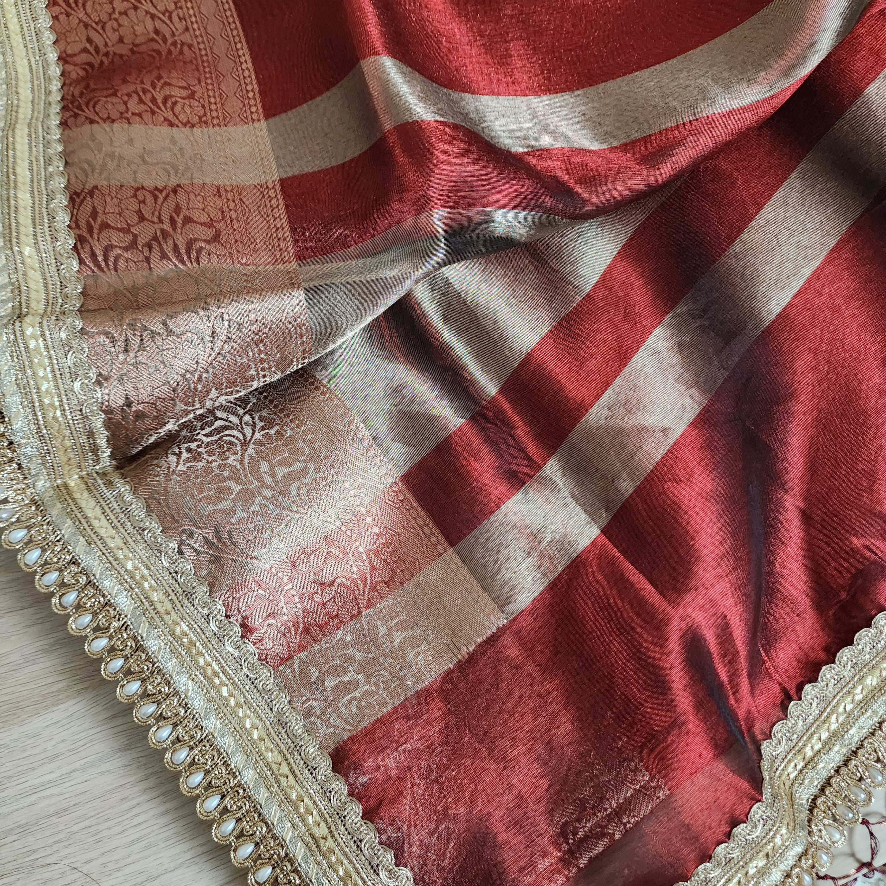 Carmine Red Tissue Silk Saree with beaded lace work