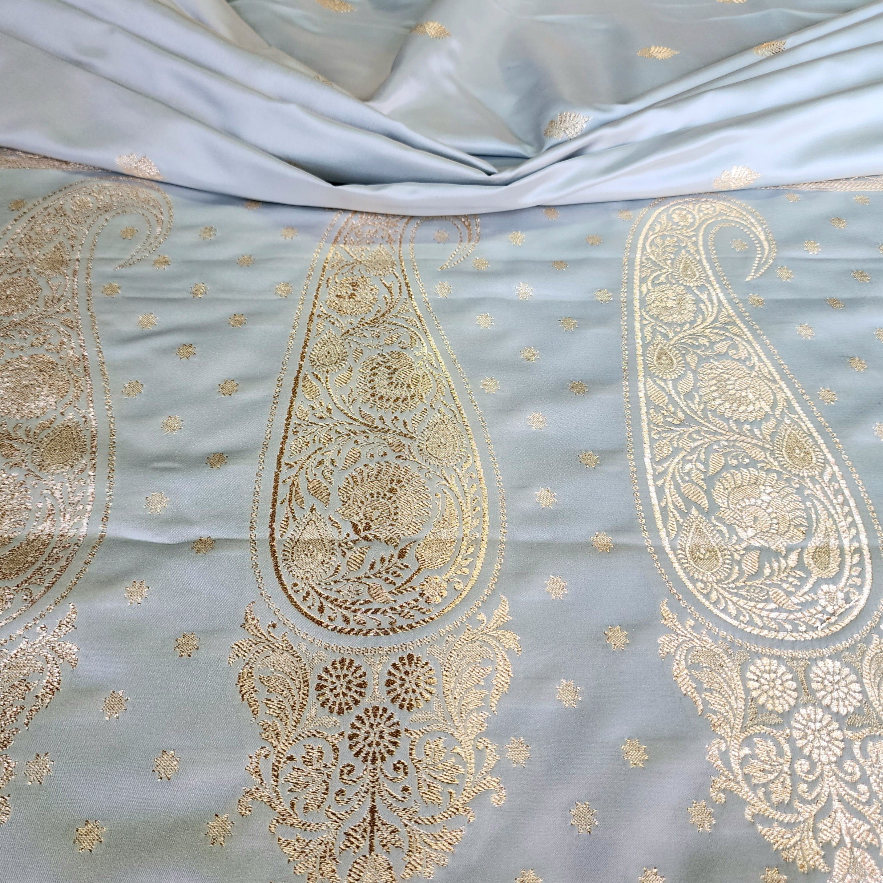 Ice Blue Katan Silk Saree with Peach Beige Gold Zari Border