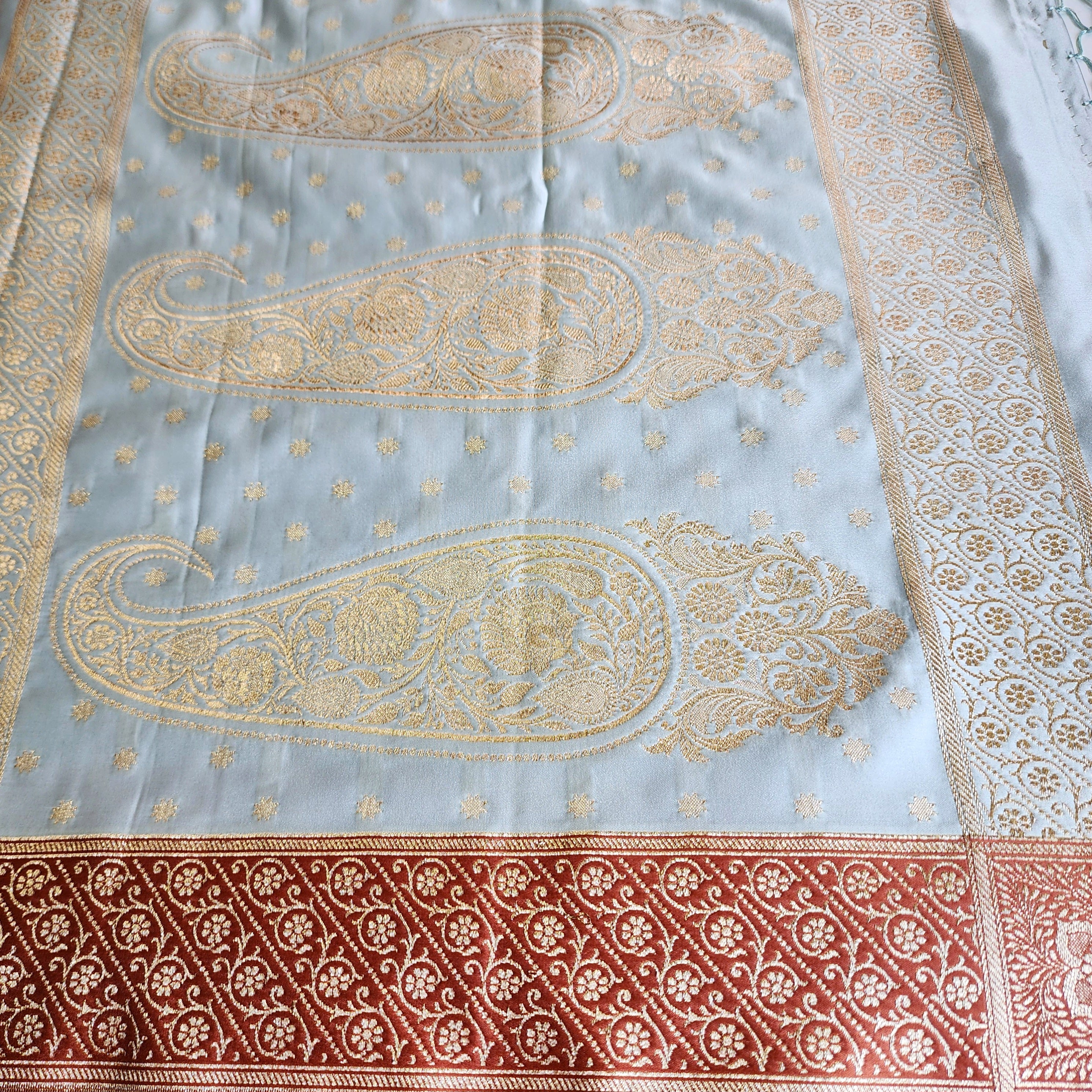 Ice Blue Katan Silk Saree with Peach Beige Gold Zari Border