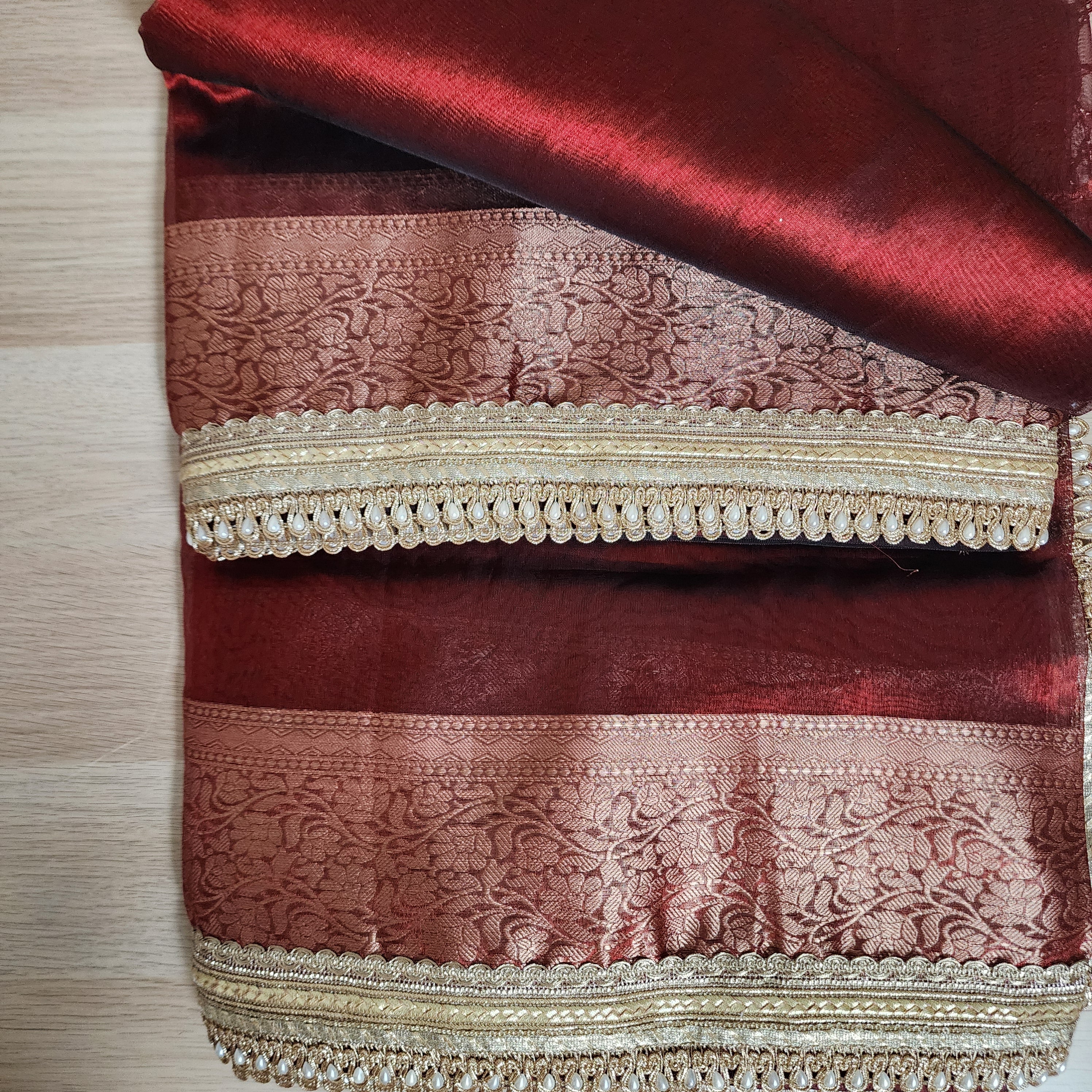 Carmine Red Tissue Silk Saree with beaded lace work