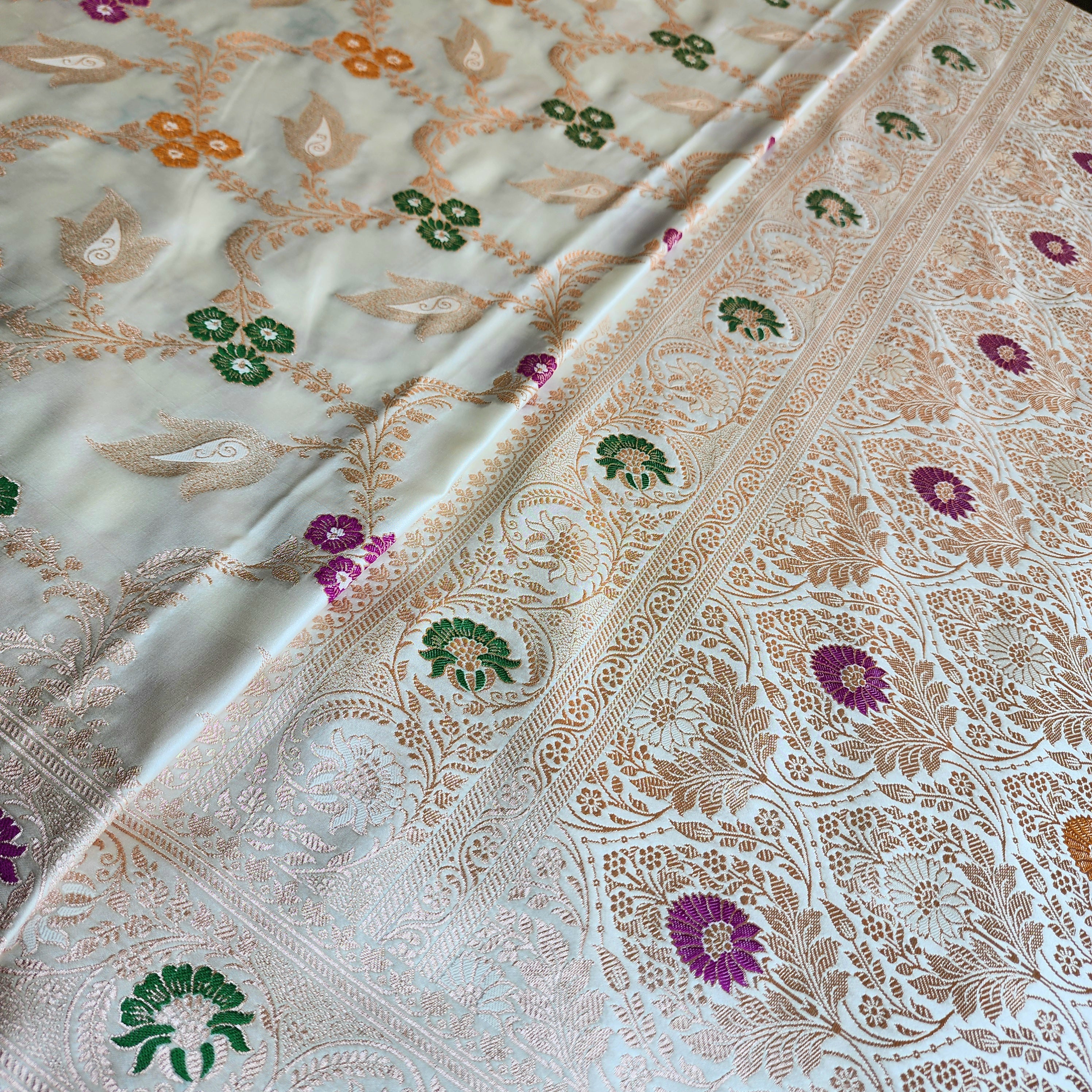 Enriched White Banarasi Katan Silk Saree with Multicolor Meenakari Floral Jaal