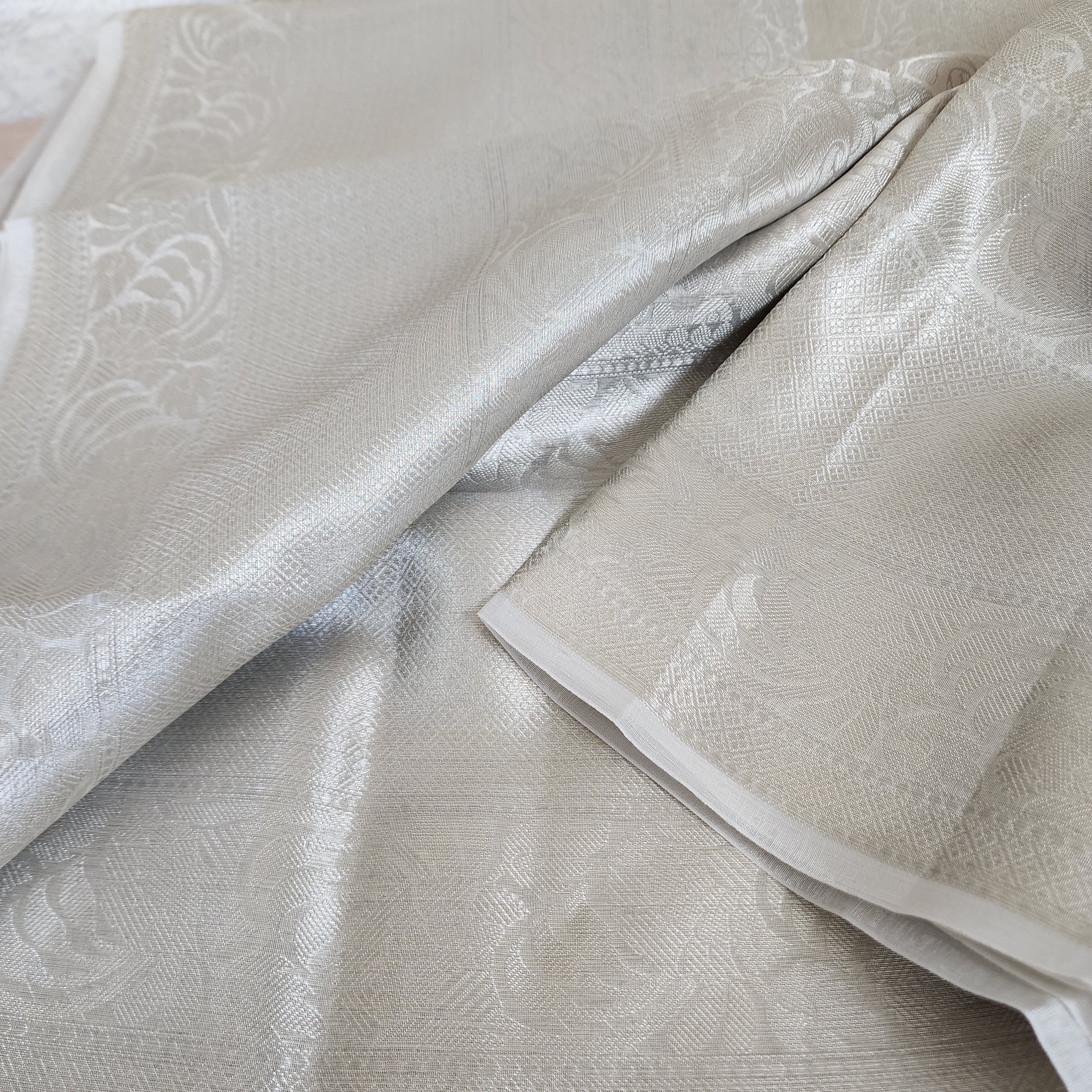 Classic Off-White Water Zari Tissue Sari with tassels