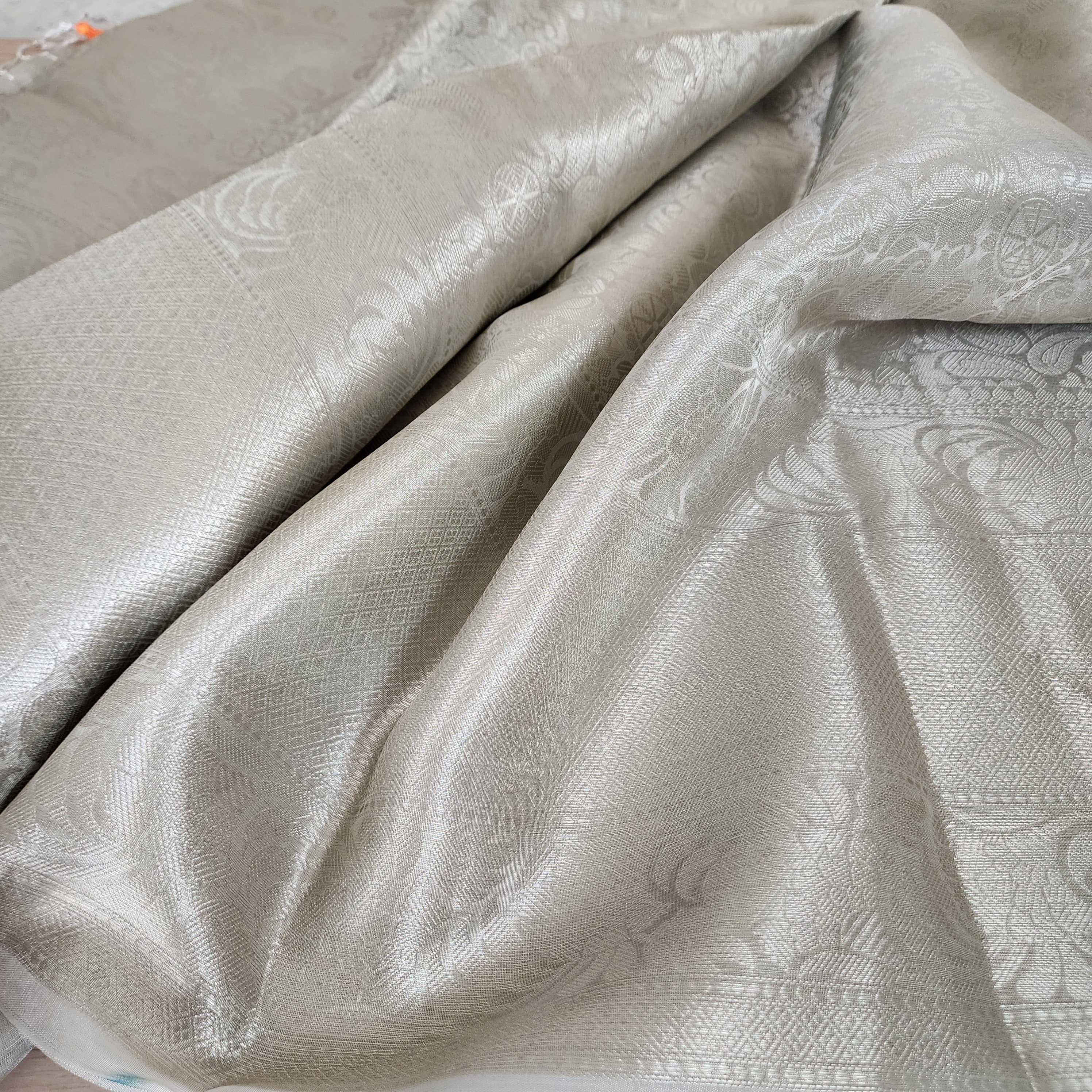 Classic Off-White Water Zari Tissue Sari with tassels