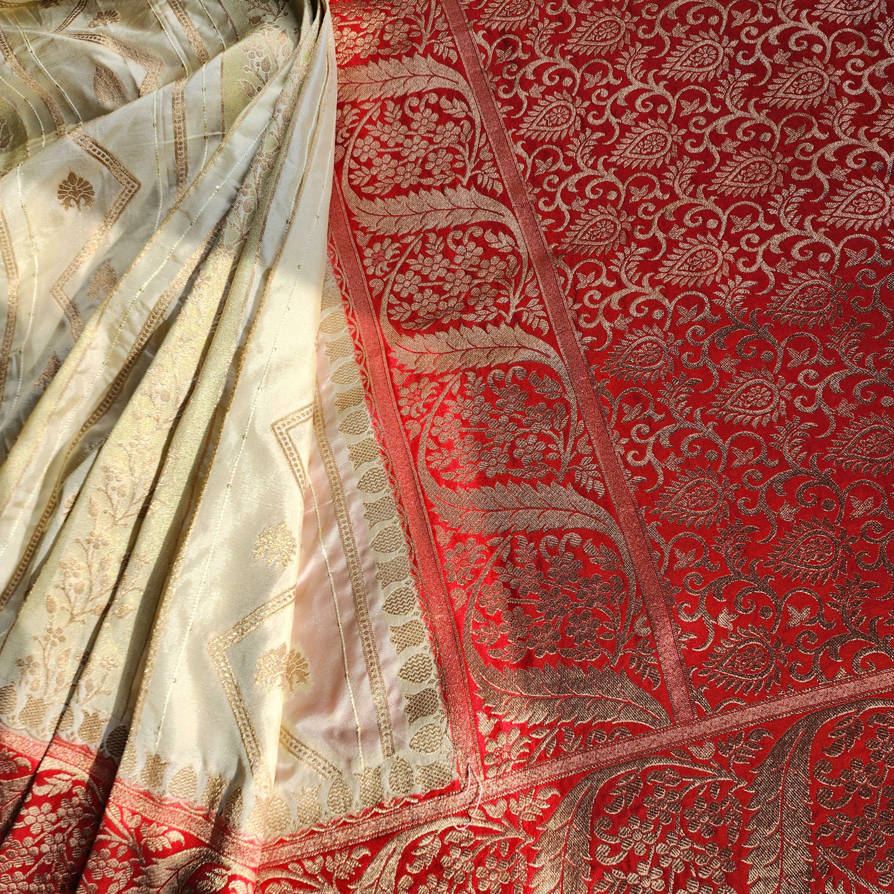 Rich White Crepe Georgette Silk Saree with Red Border and Gold Zari Detailing