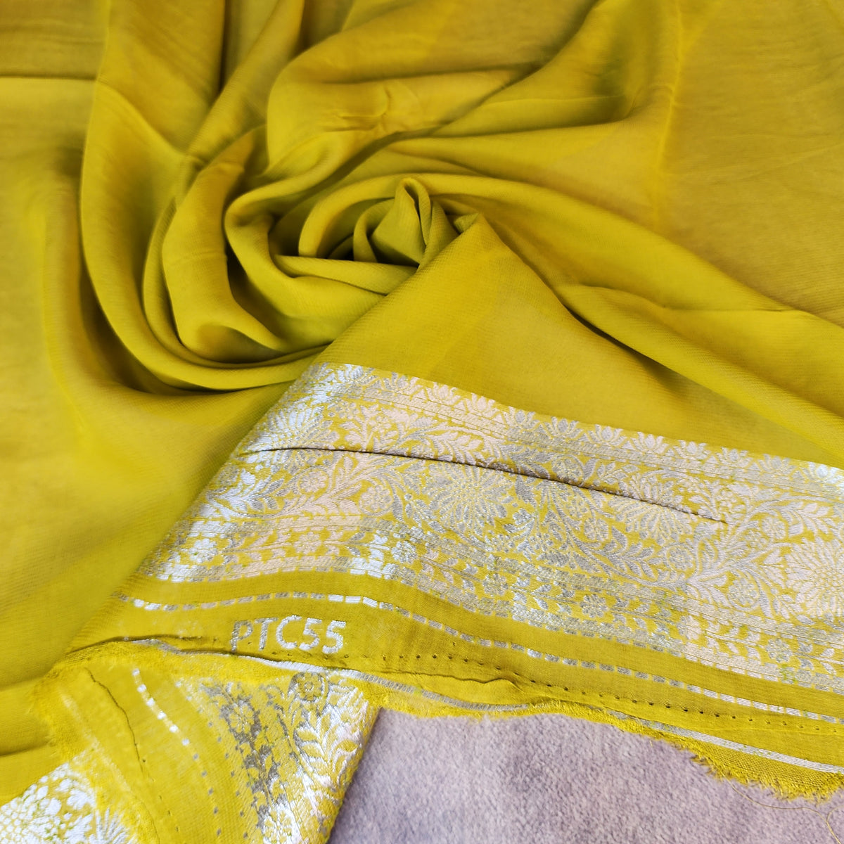 Yellowish Green Muslin Silk Saree with Floral Weave