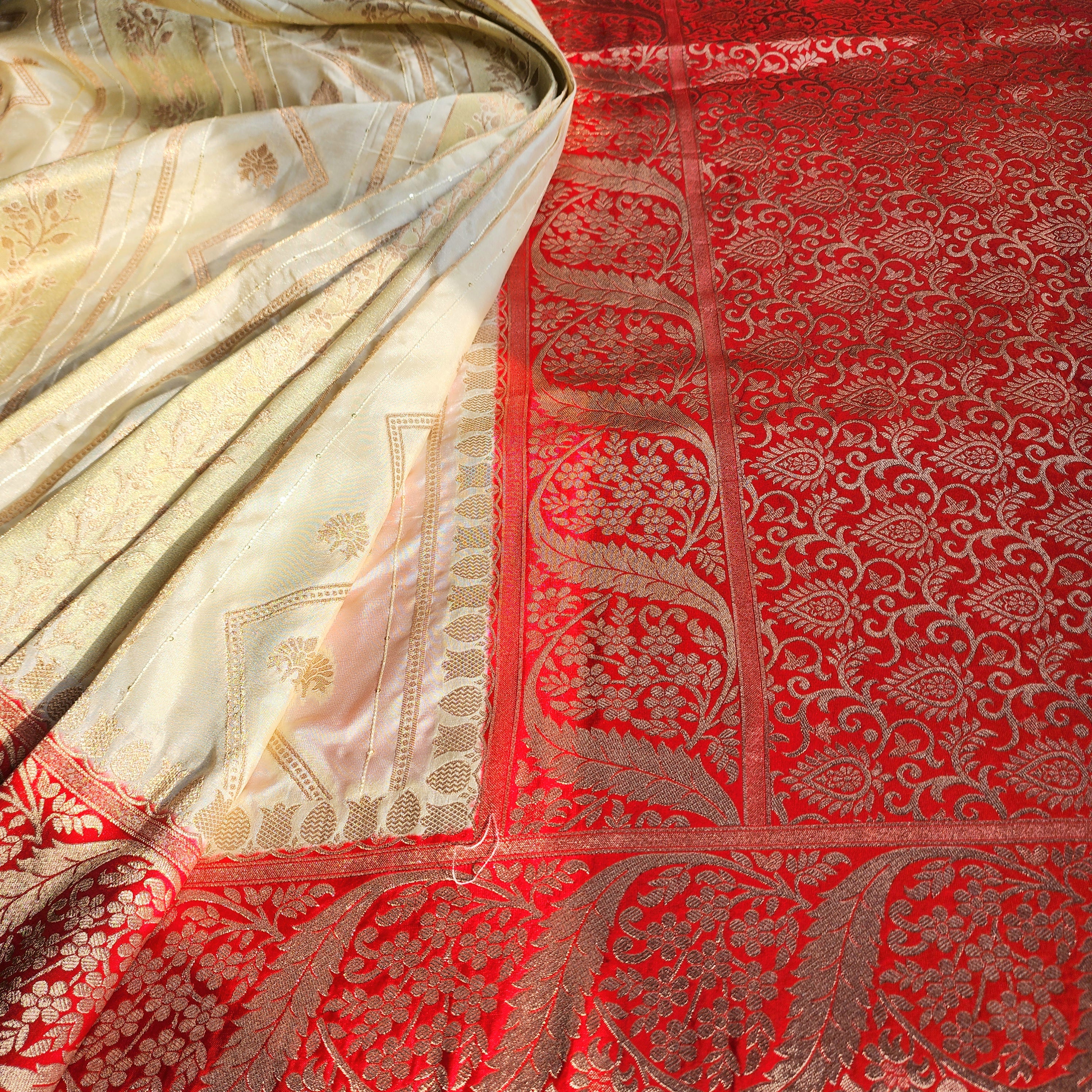 Rich White Crepe Georgette Silk Saree with Red Border and Gold Zari Detailing