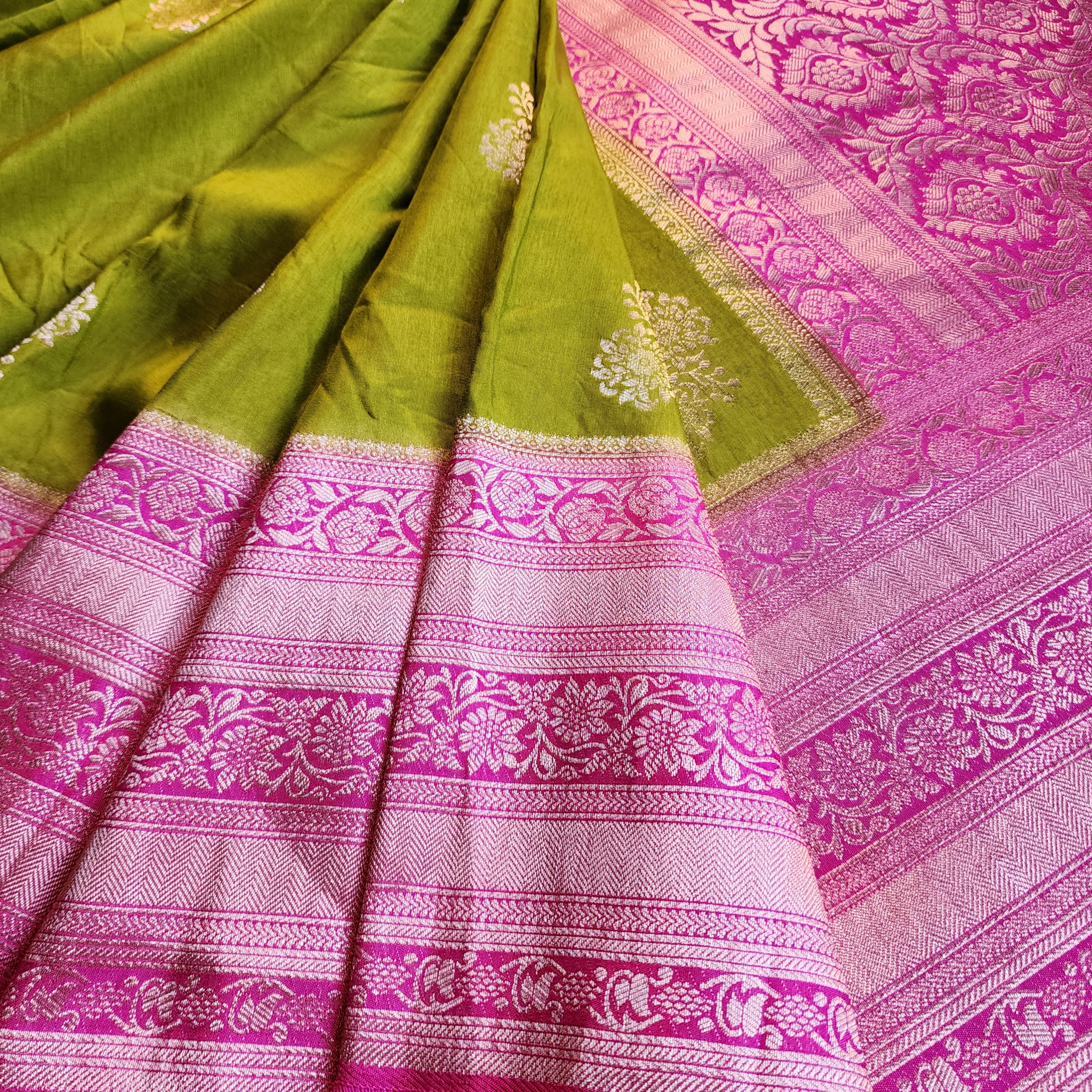 Olive Green Muslin Silk Saree with Traditional Silver Zari Work