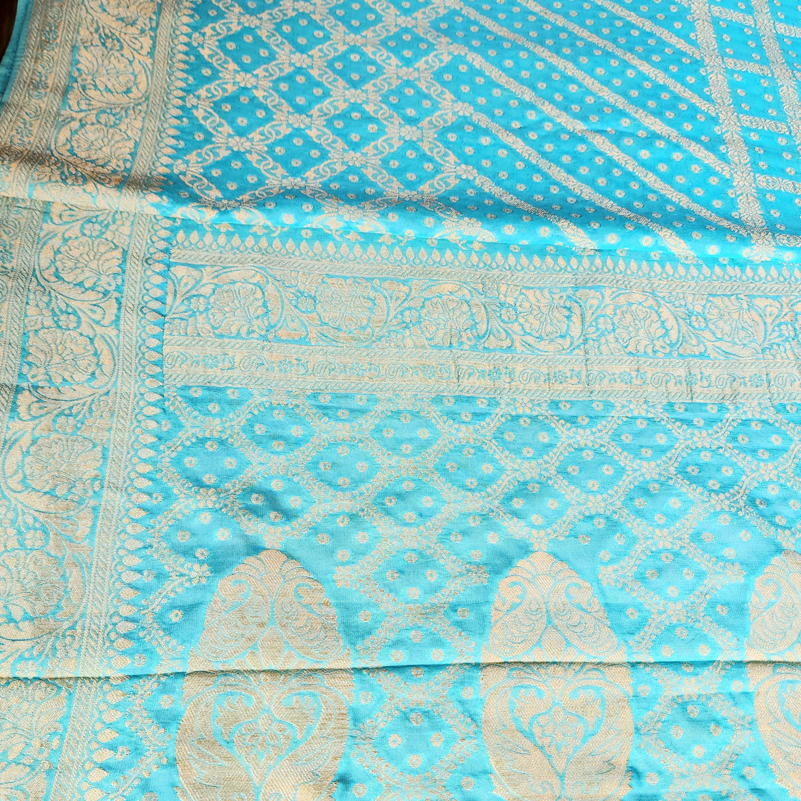 Turquoise Pure Khaddi Georgette Banarasi Saree with Golden Zari