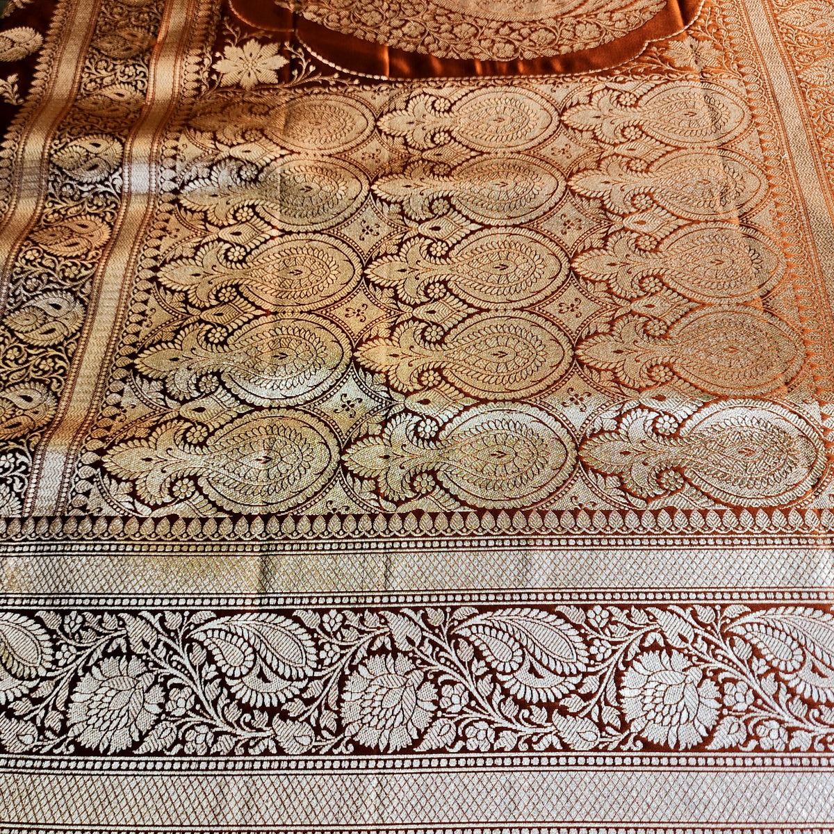 Rich Burnt Copper Pure Banarasi Katan Silk Saree with light Gold Zari Weaving
