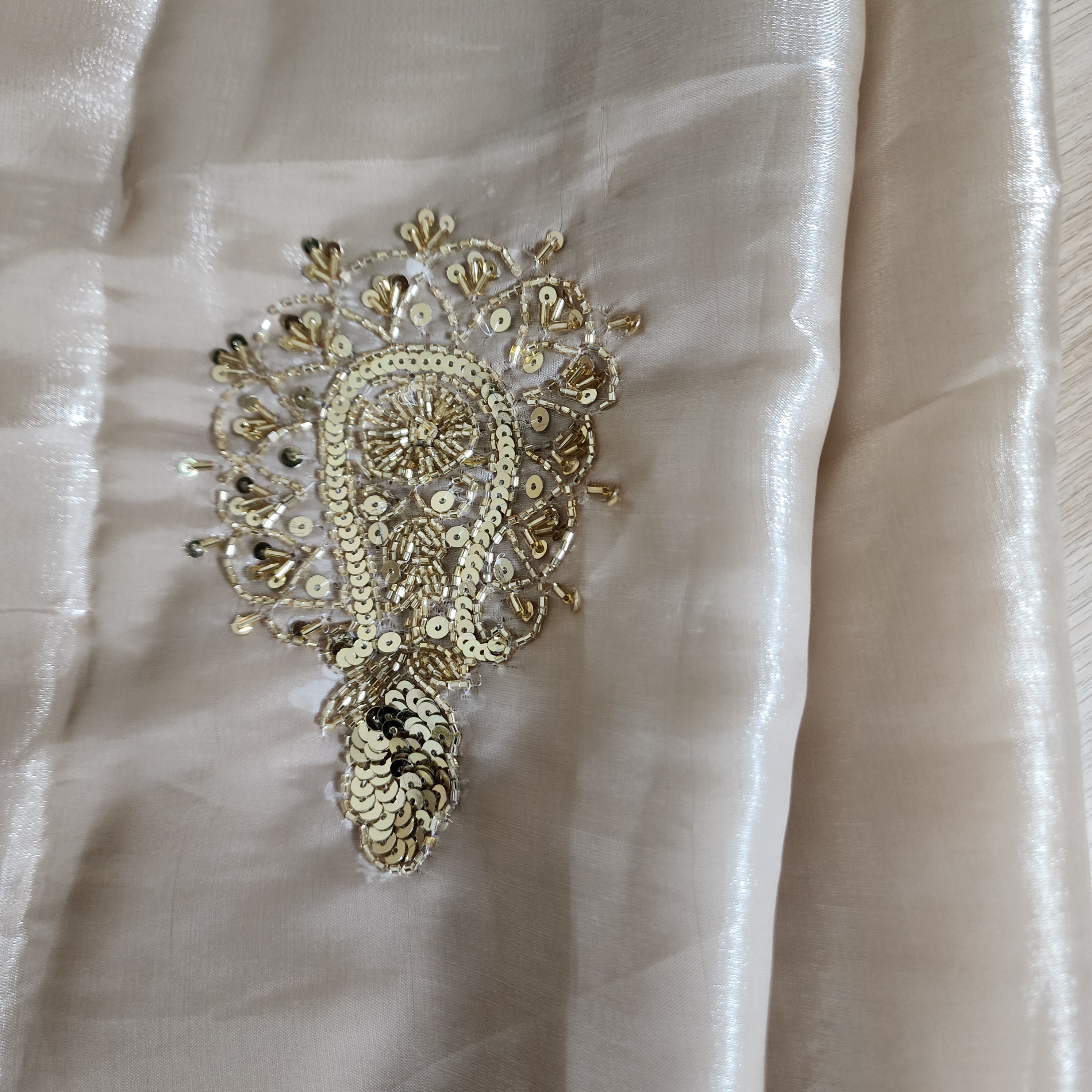 Glossy Metallic Tissue Silk Saree with Hand Embroidery