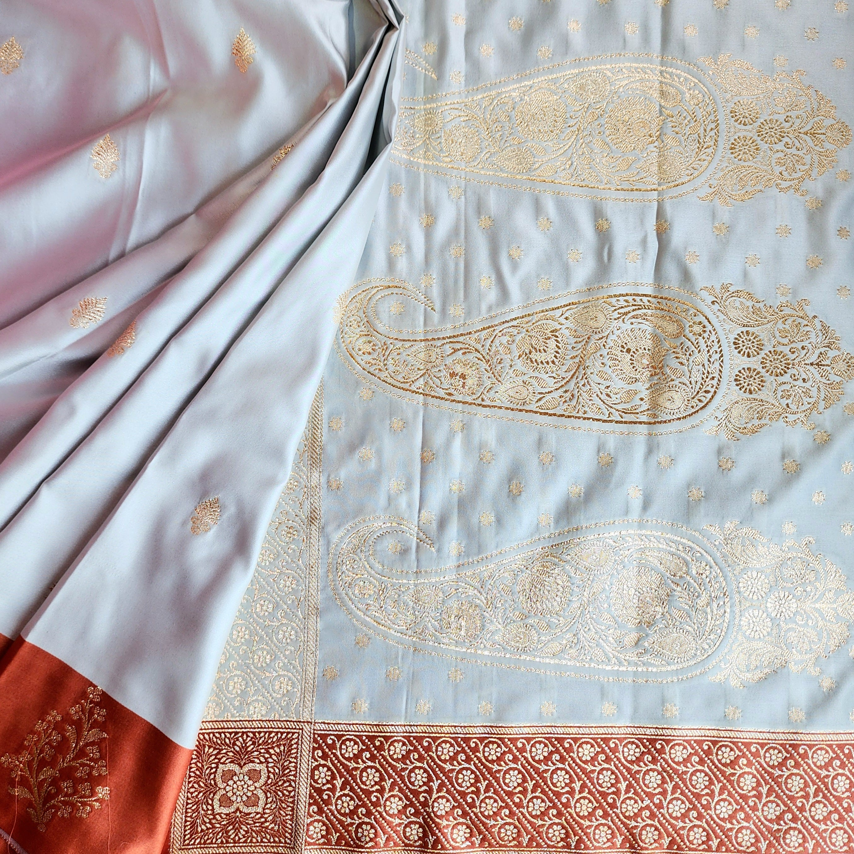 Ice Blue Katan Silk Saree with Peach Beige Gold Zari Border