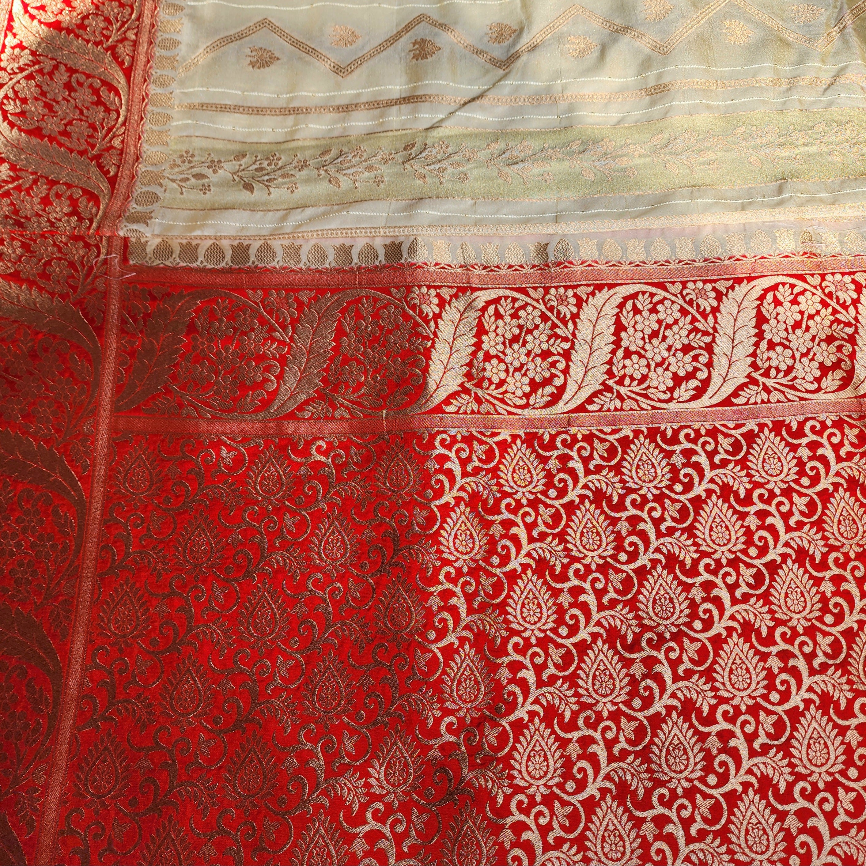Rich White Crepe Georgette Silk Saree with Red Border and Gold Zari Detailing
