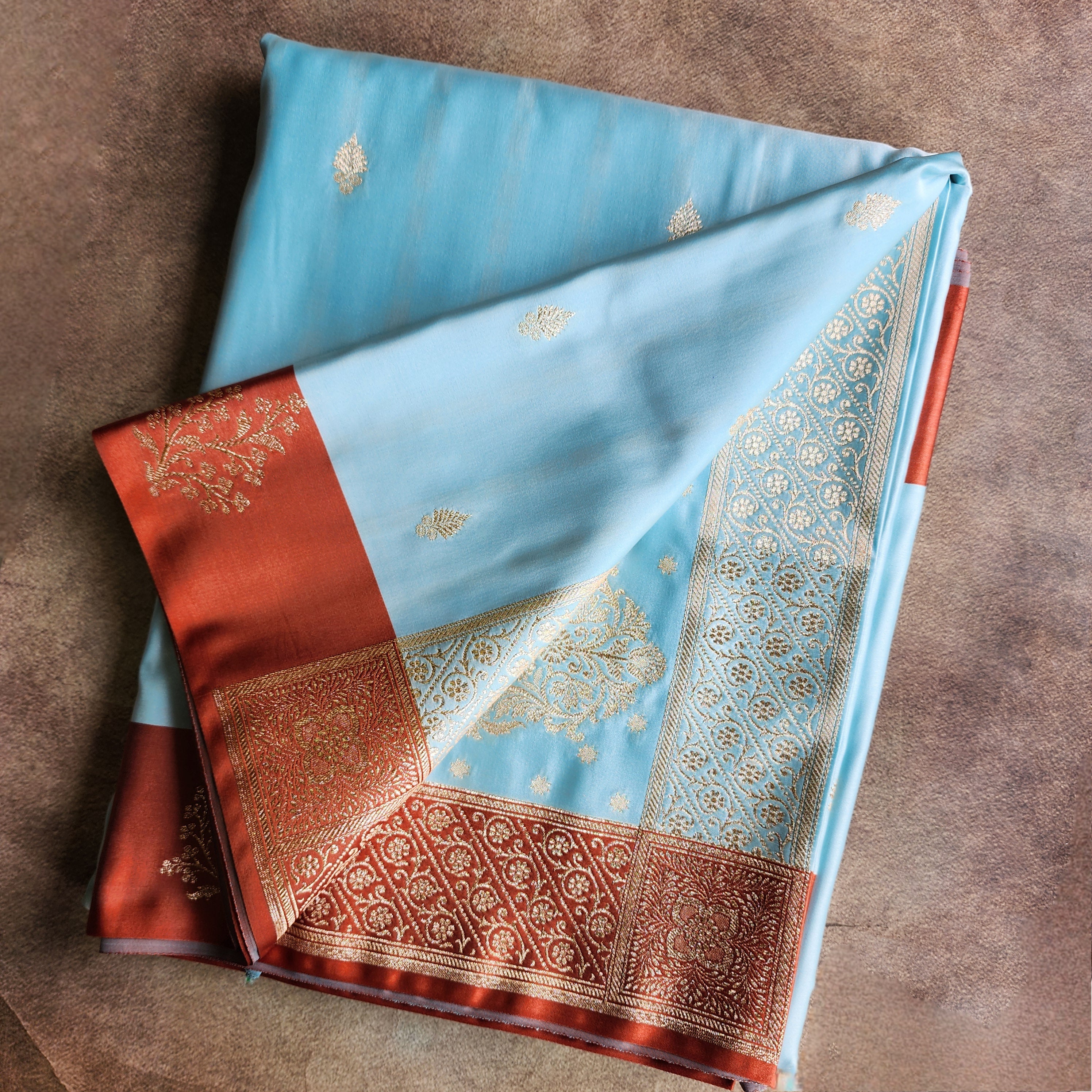 Powder Blue Katan Silk Saree with Rust Orange Silver Zari Border