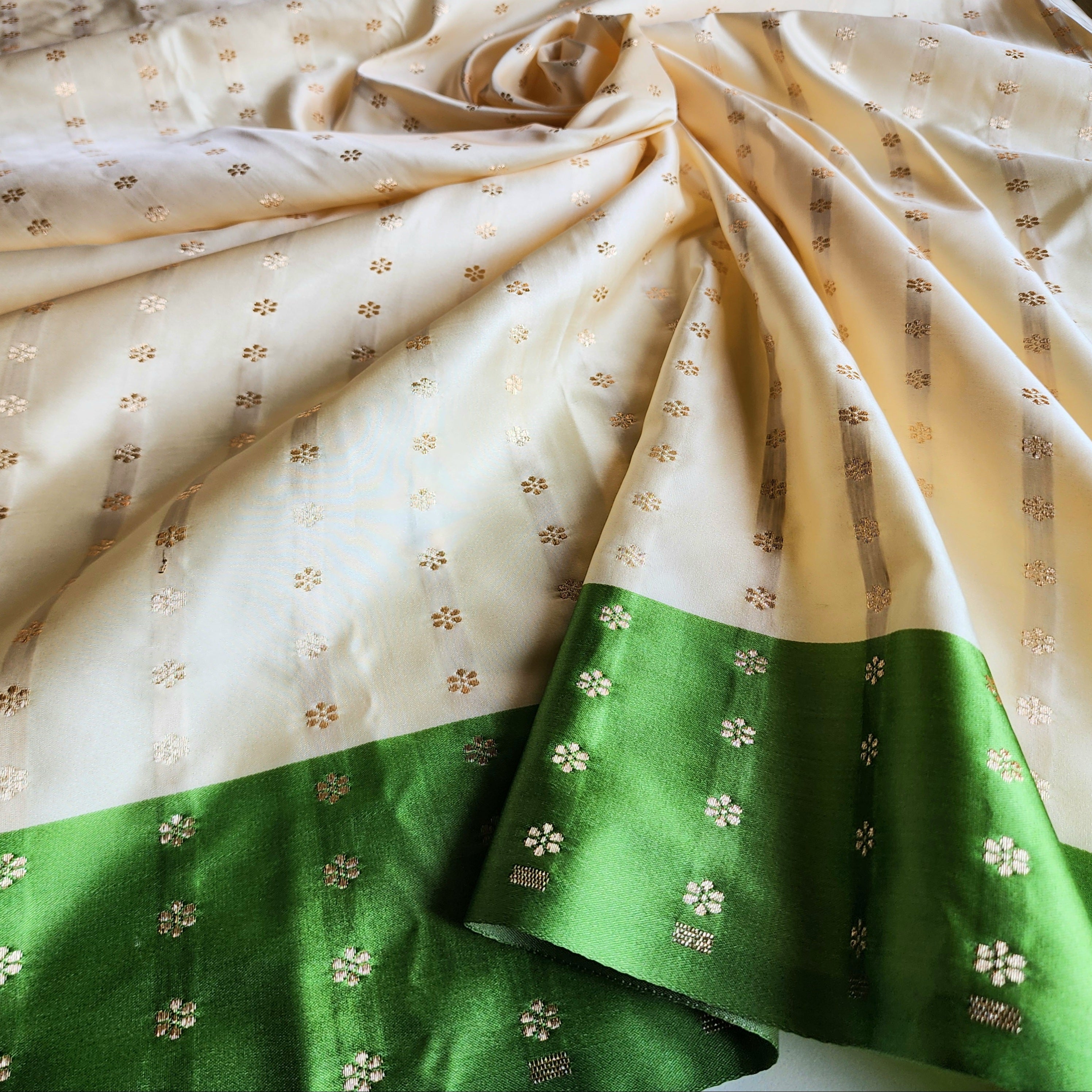 White Katan Silk Saree with Green and Gold Zari Border