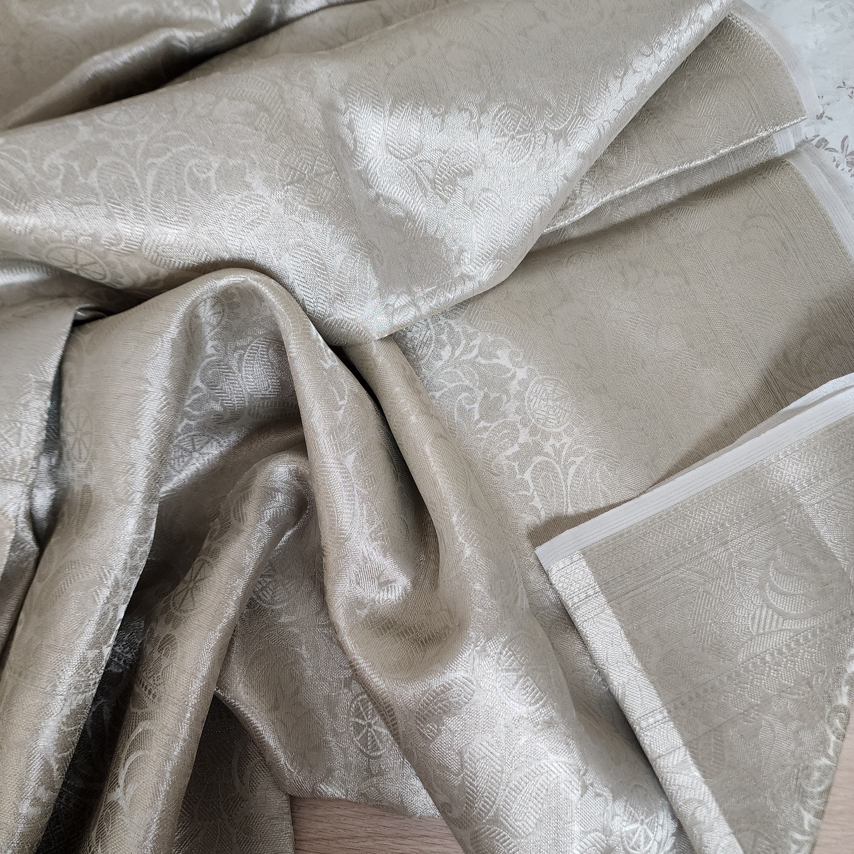 Classic Off-White Water Zari Tissue Sari with tassels