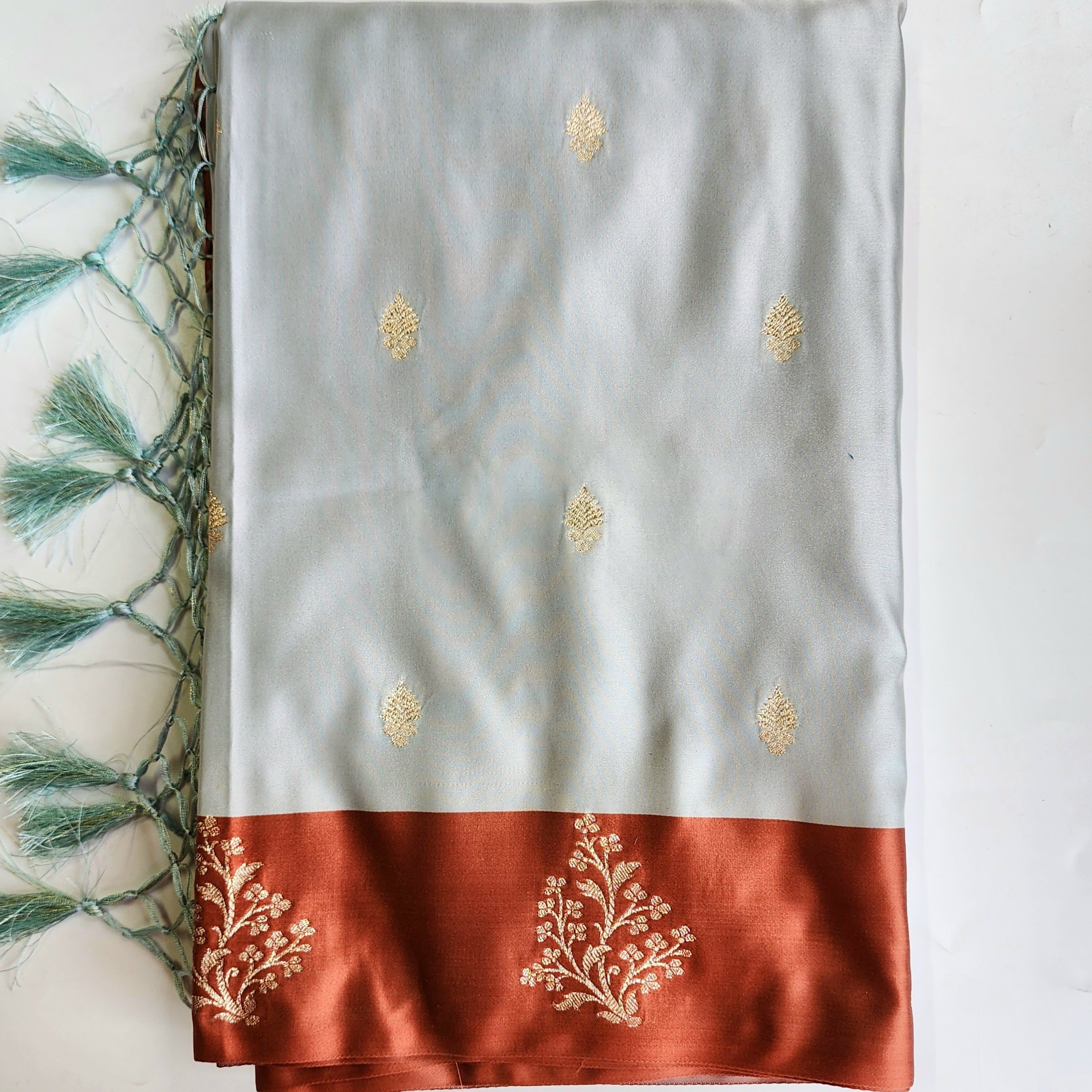Ice Blue Katan Silk Saree with Peach Beige Gold Zari Border
