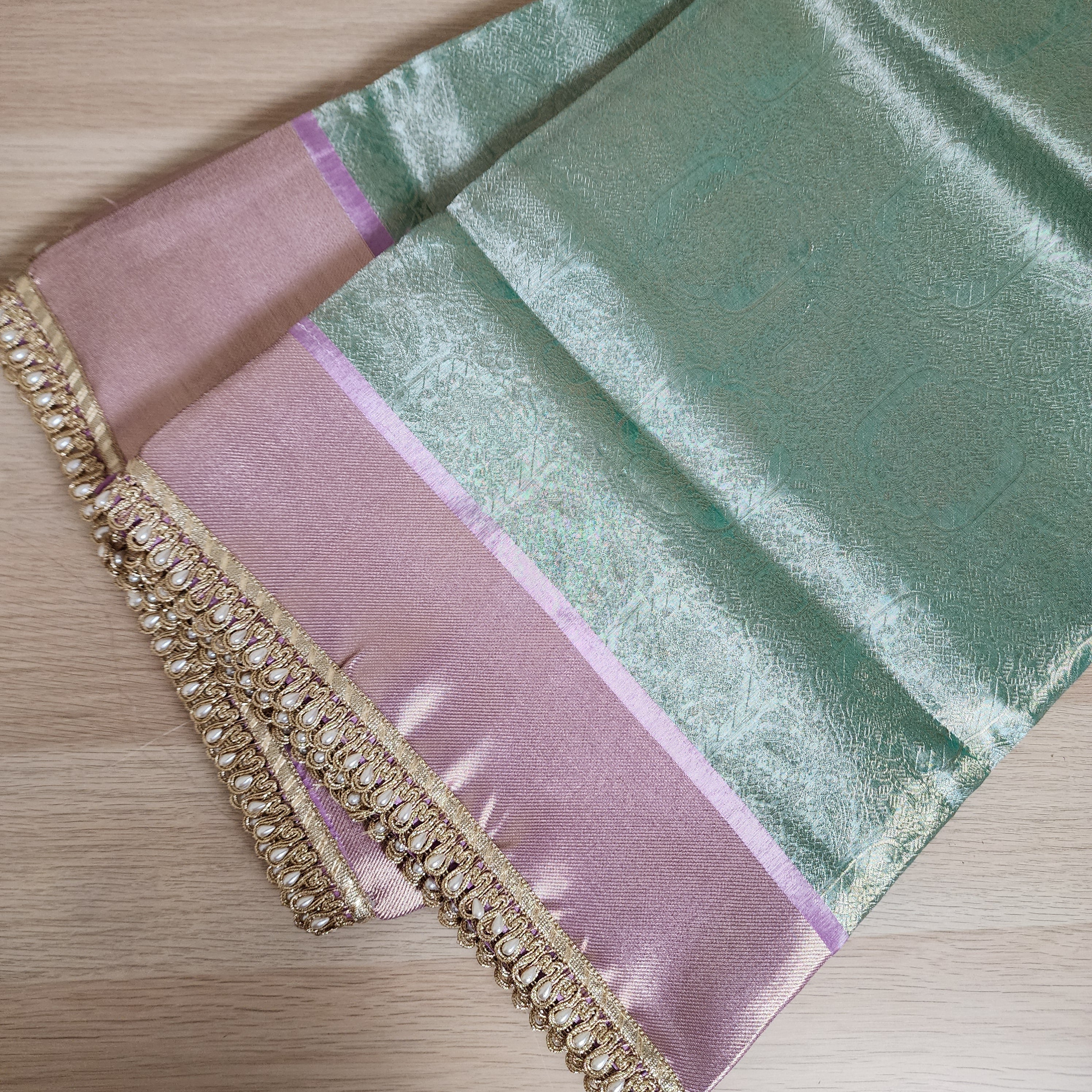 Pastel Sea Green and Pink Brocade Tissue Saree with beaded lace work