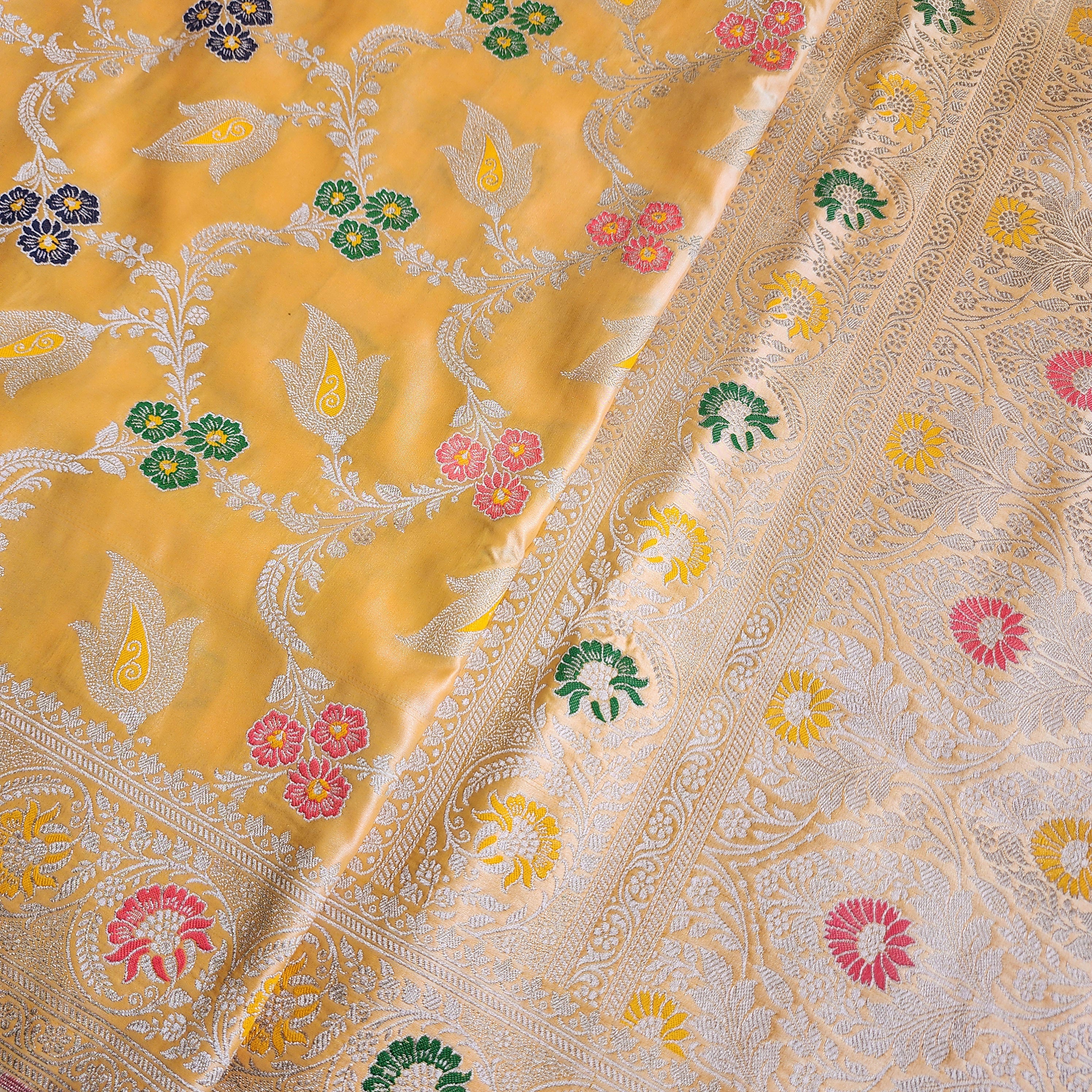 Enriched Light Orange Banarasi Katan Silk Saree with Multicolor Meenakari Floral Jaal