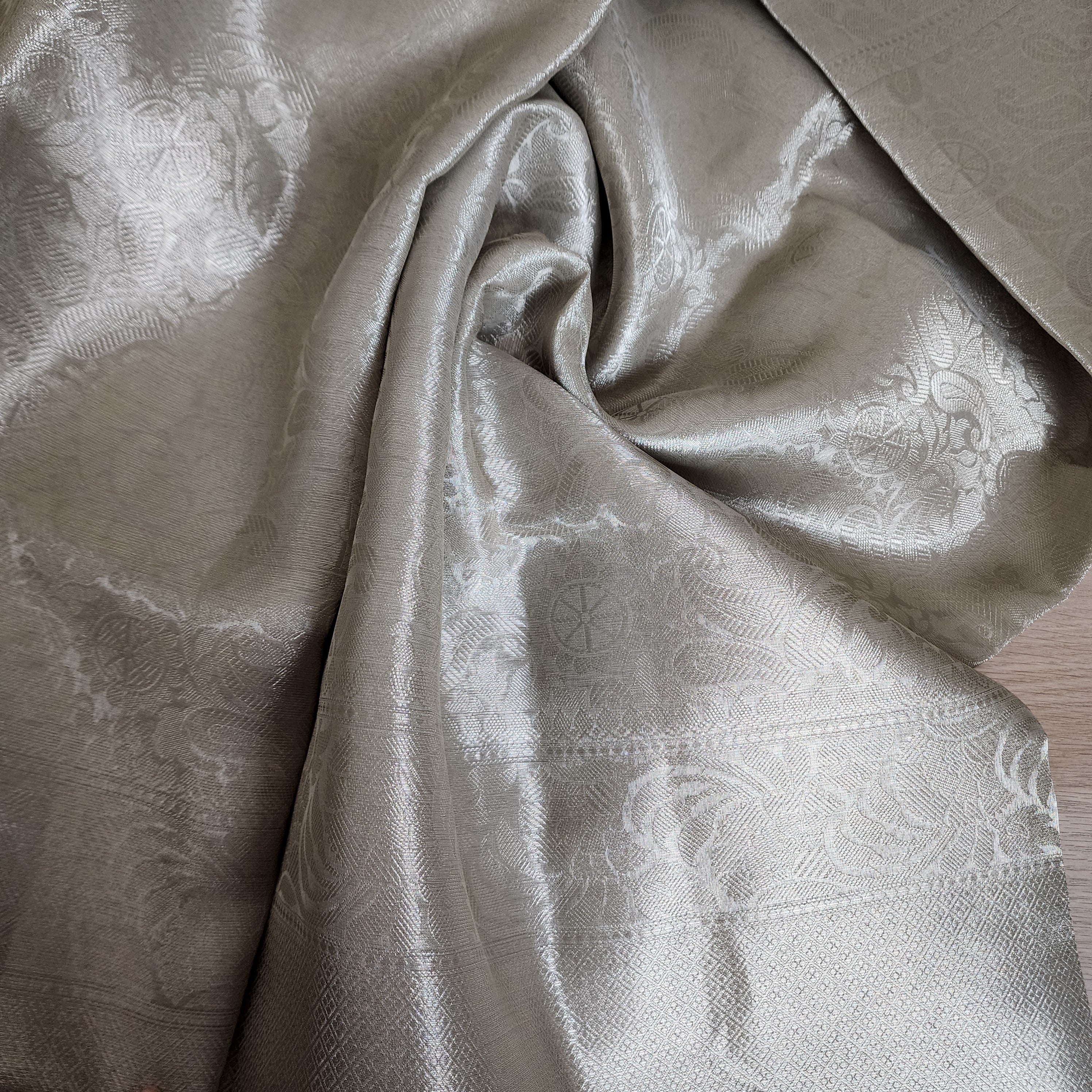 Classic Off-White Water Zari Tissue Sari with tassels