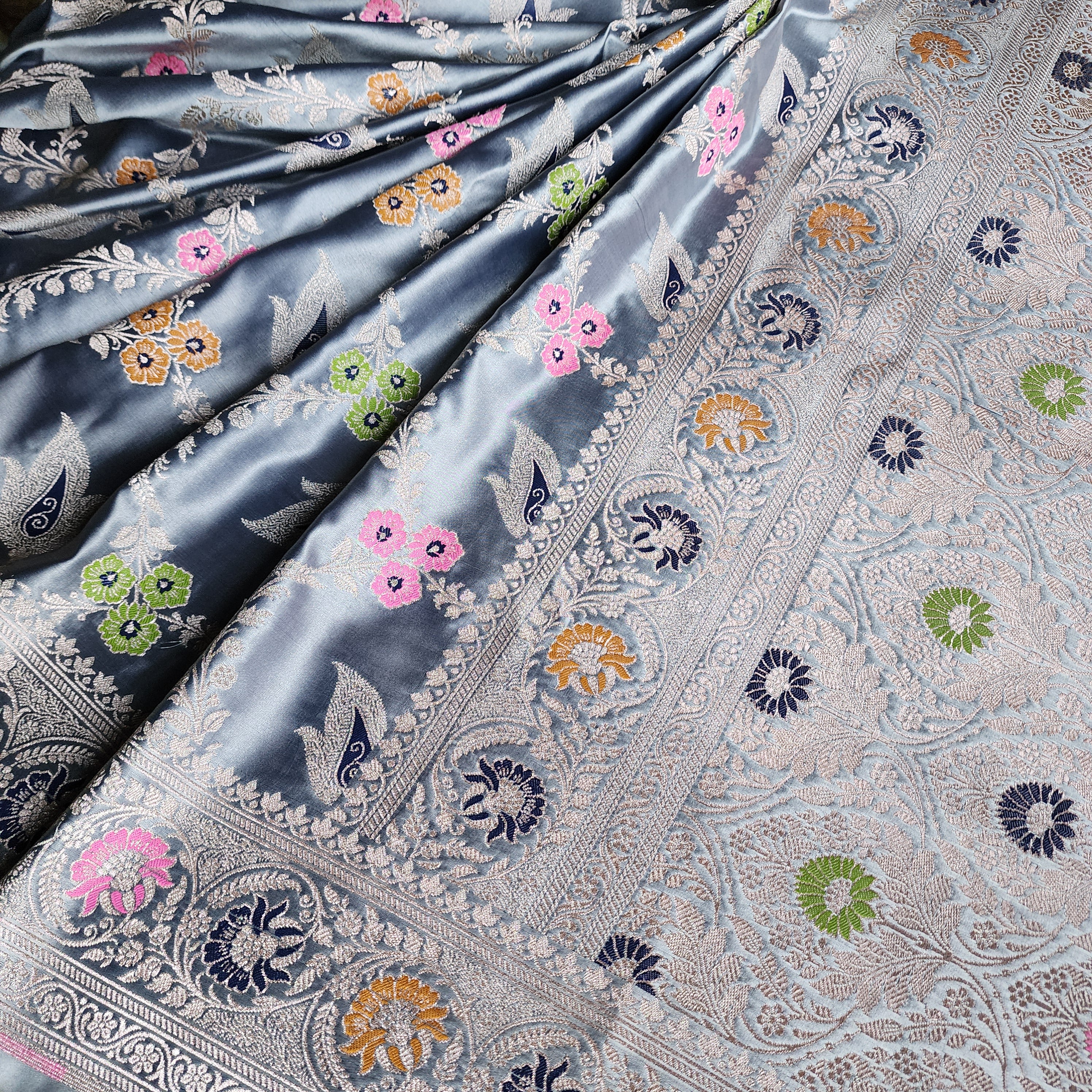 Enriched Dusky Blue Banarasi Katan Silk Saree with Multicolor Meenakari Floral Jaal