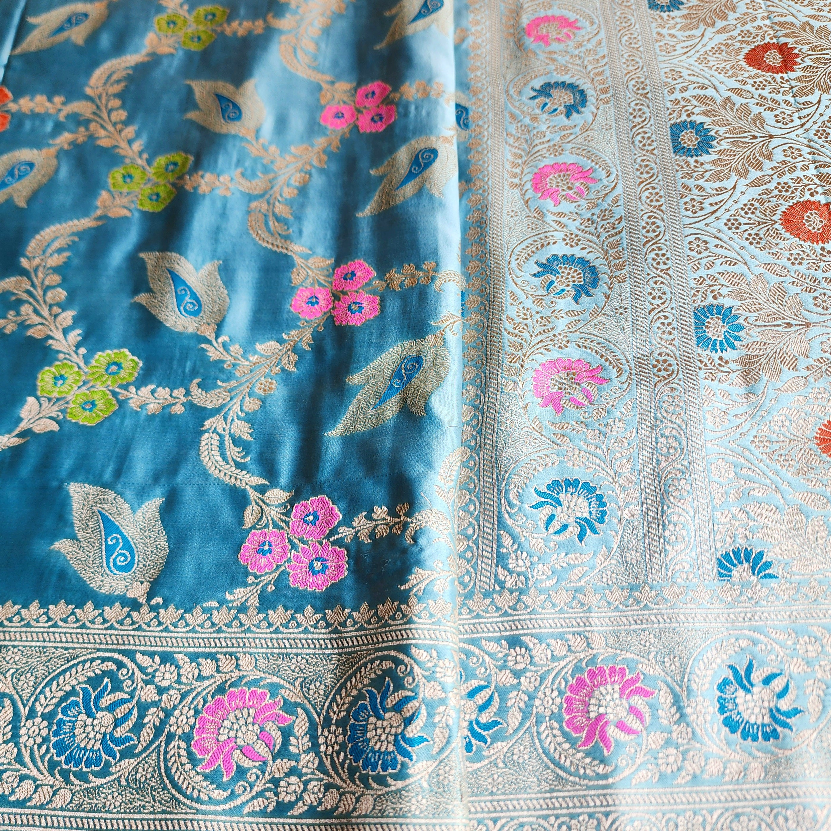 Enriched Powder Blue Banarasi Katan Silk Saree with Multicolor Meenakari Floral Jaal