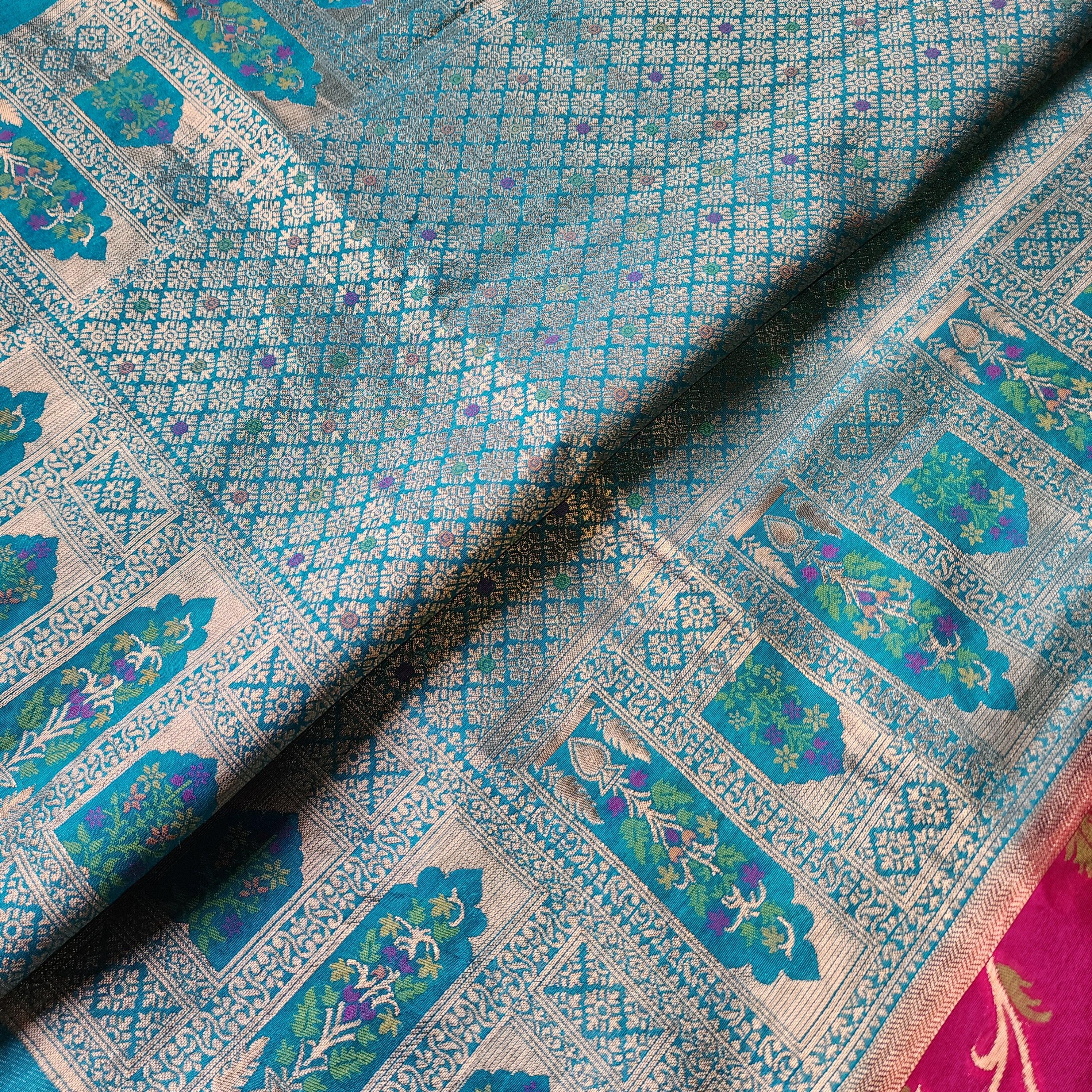 Rani Pink Dupion Patola with Turquoise Blue Border & Heavy Gold Zari
