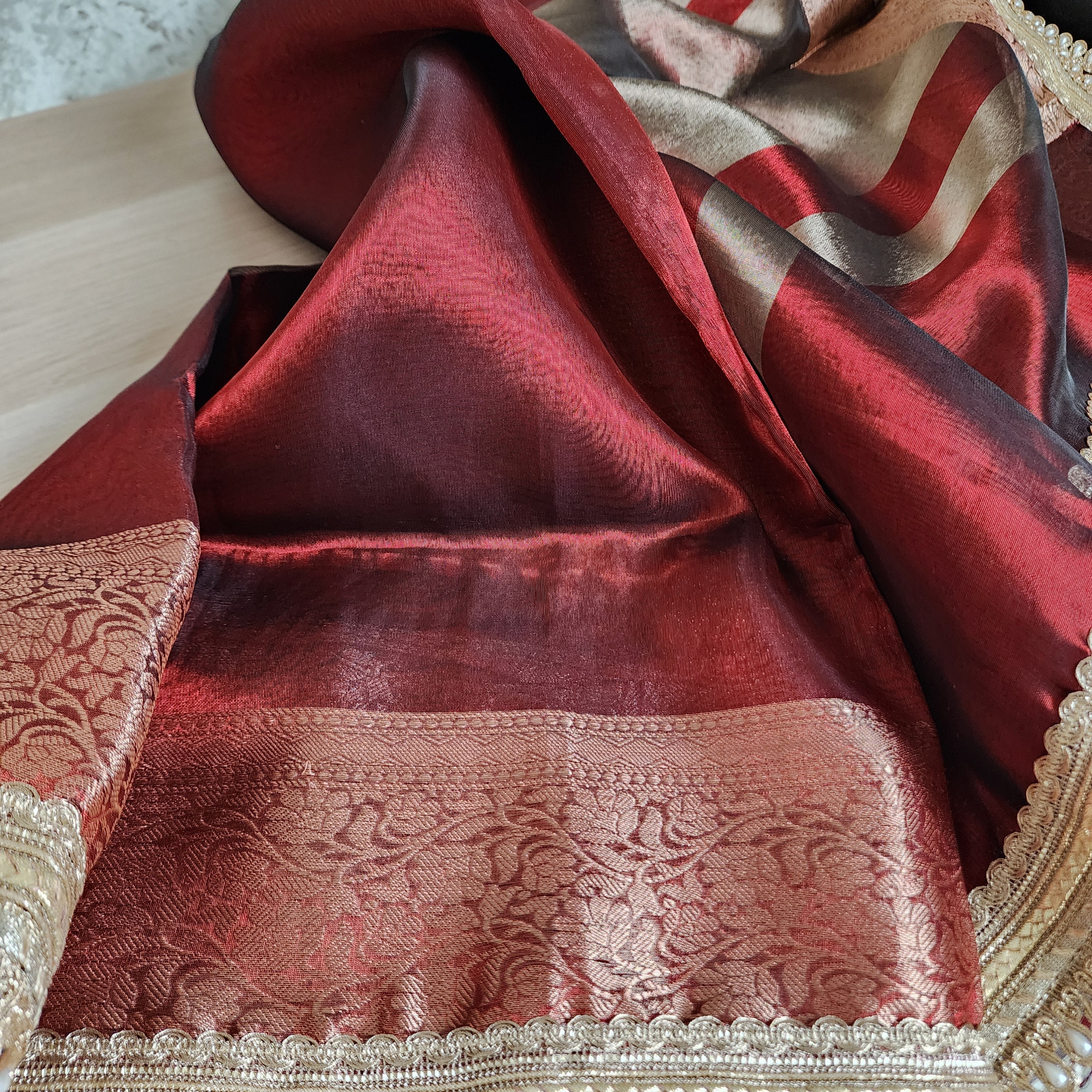 Carmine Red Tissue Silk Saree with beaded lace work