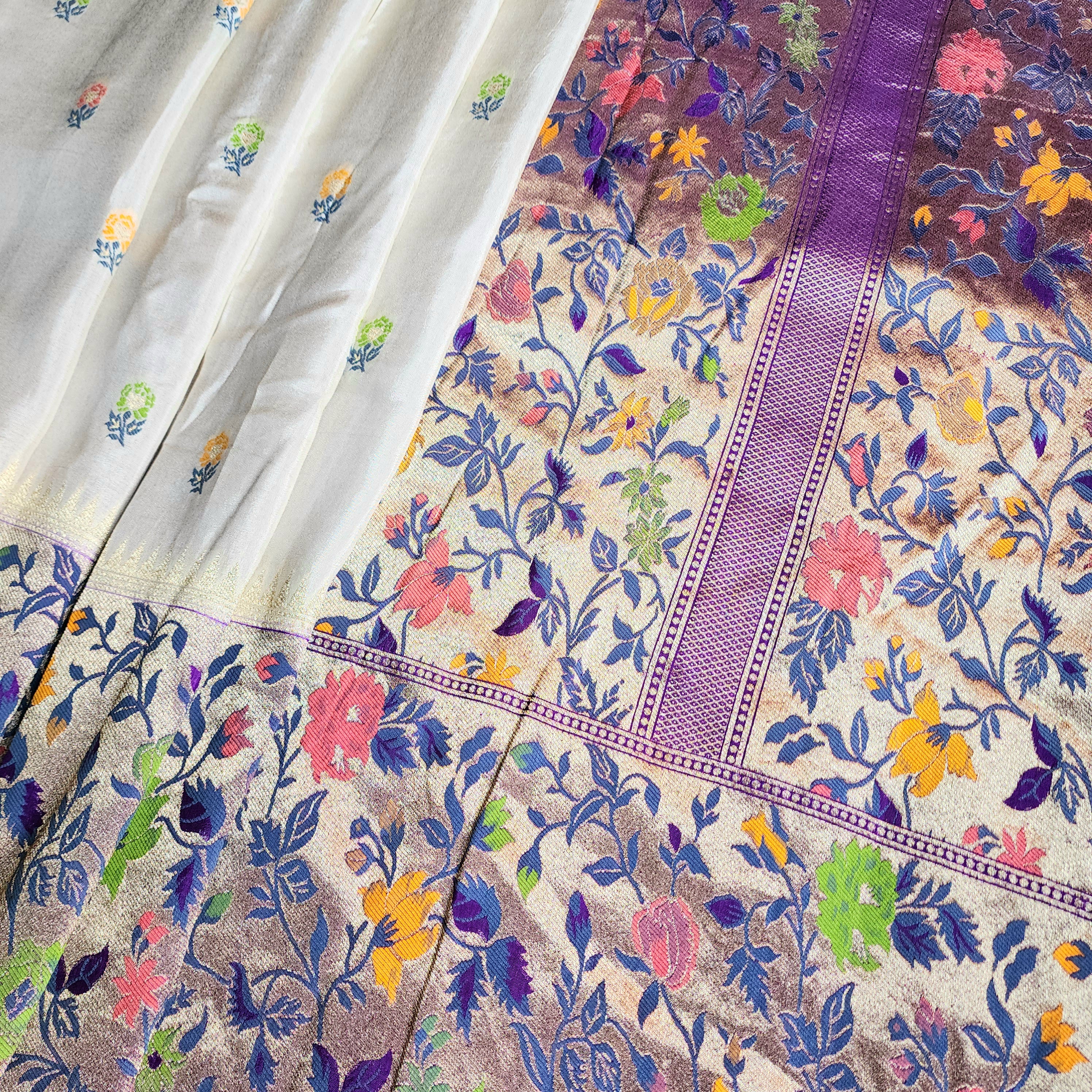 Soft Ivory Raw Silk Saree With Pastel Floral Weaving and Lilac Purple Border