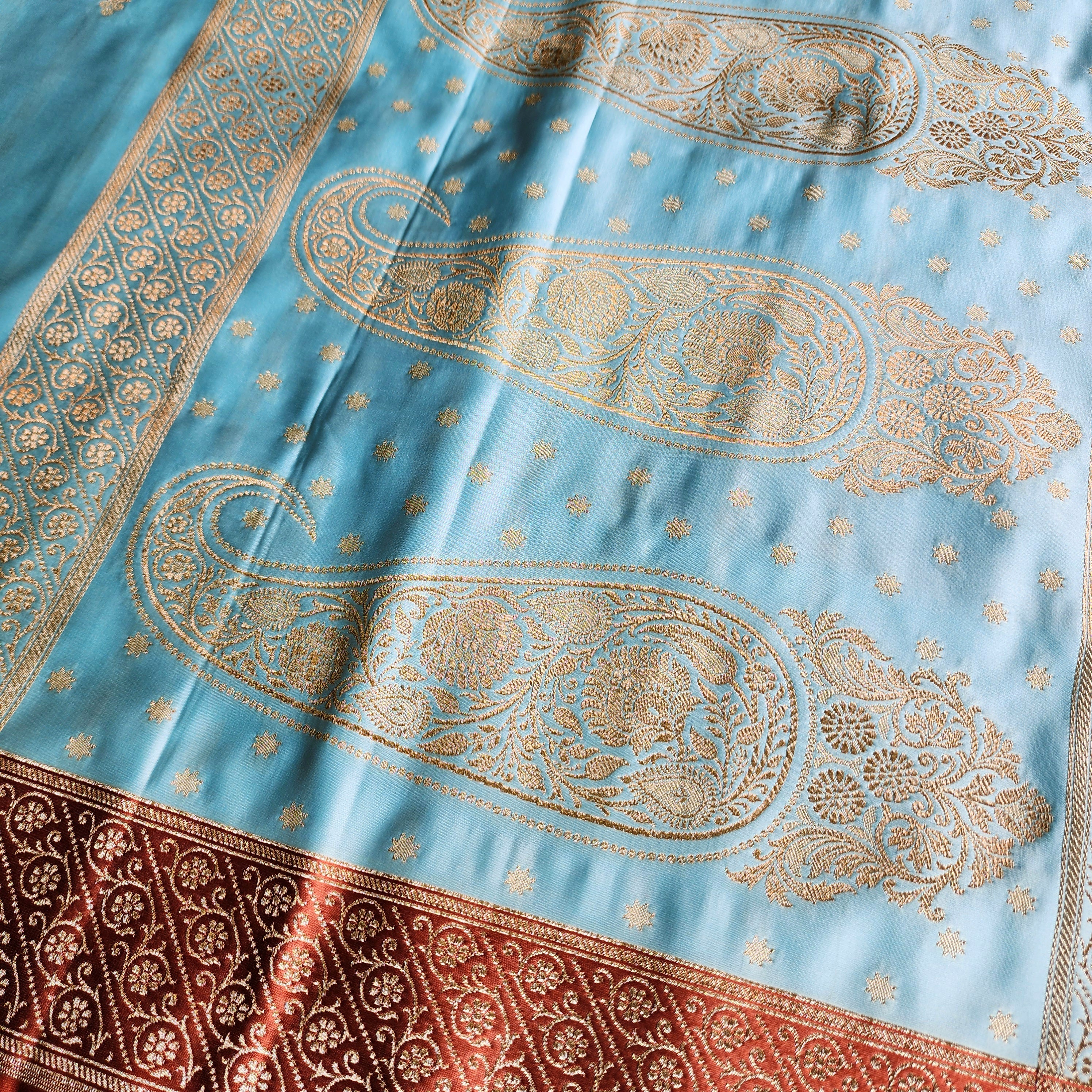 Powder Blue Katan Silk Saree with Rust Orange Gold Zari Border