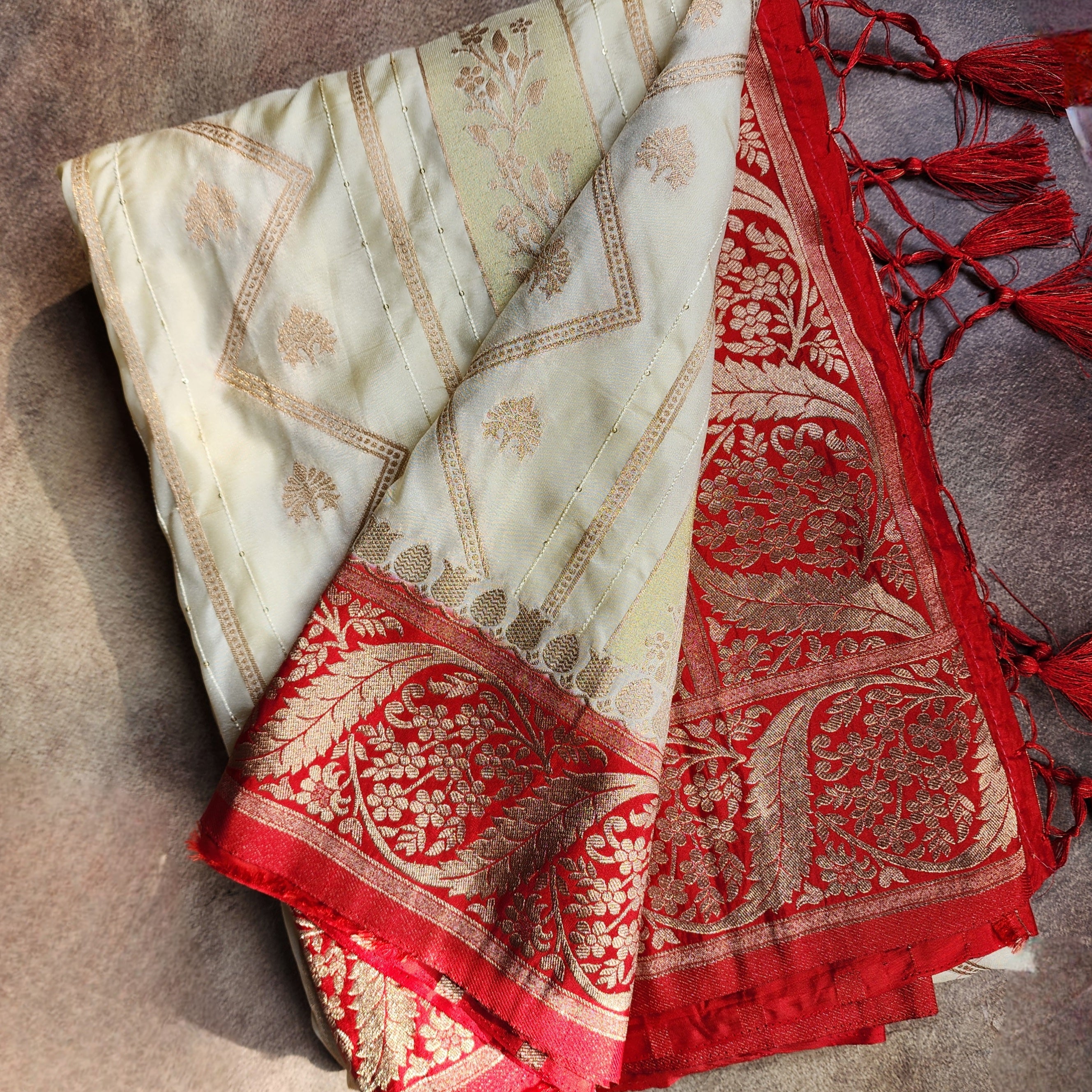 Rich White Silk Saree with Red Border and Gold Zari Detailing