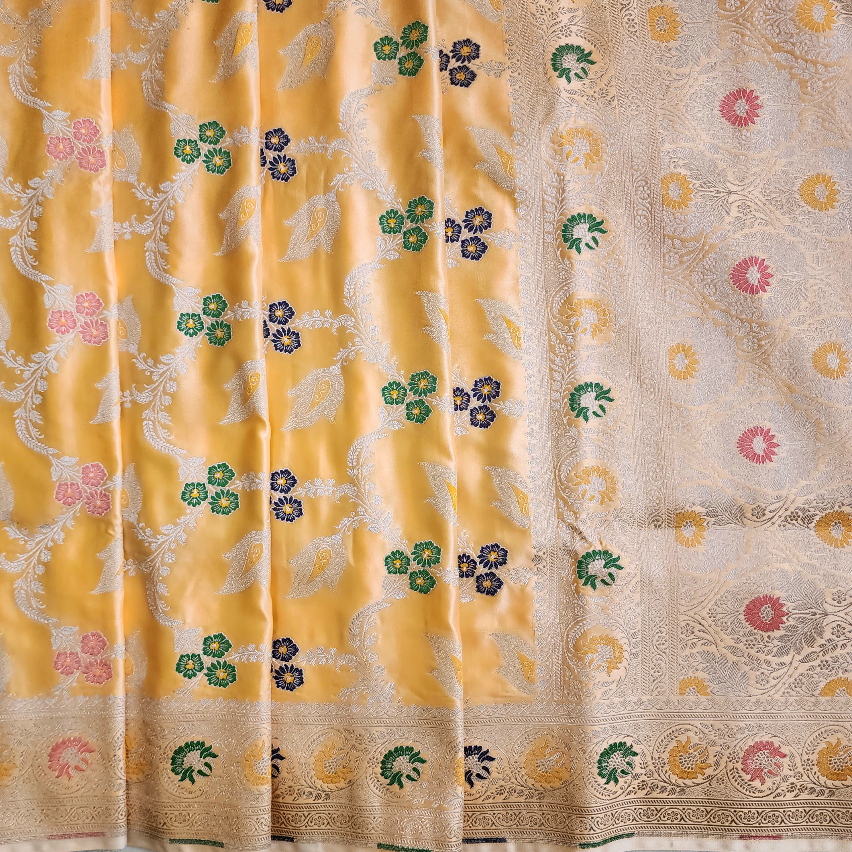 Enriched Light Orange Banarasi Katan Silk Saree with Multicolor Meenakari Floral Jaal