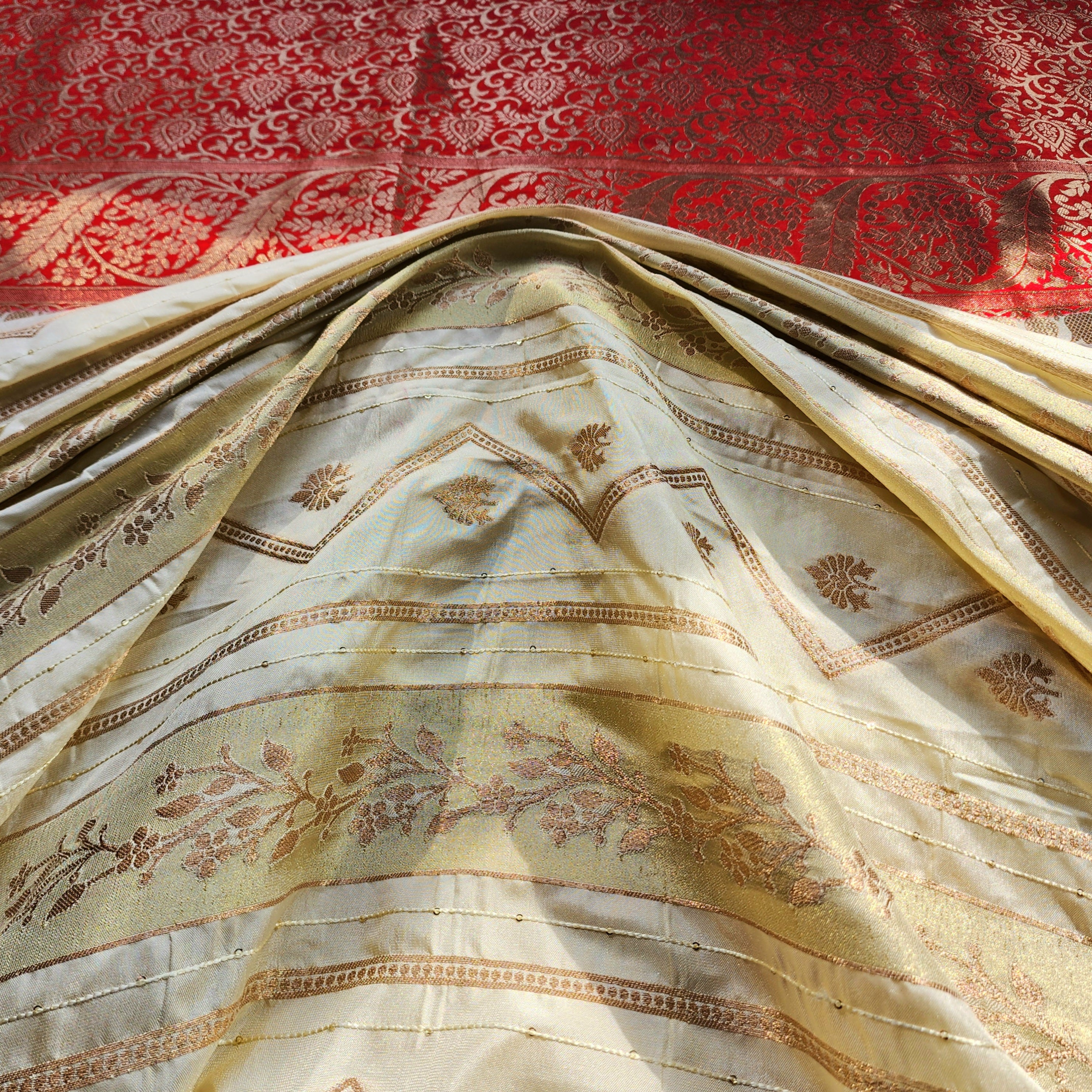 Rich White Crepe Georgette Silk Saree with Red Border and Gold Zari Detailing