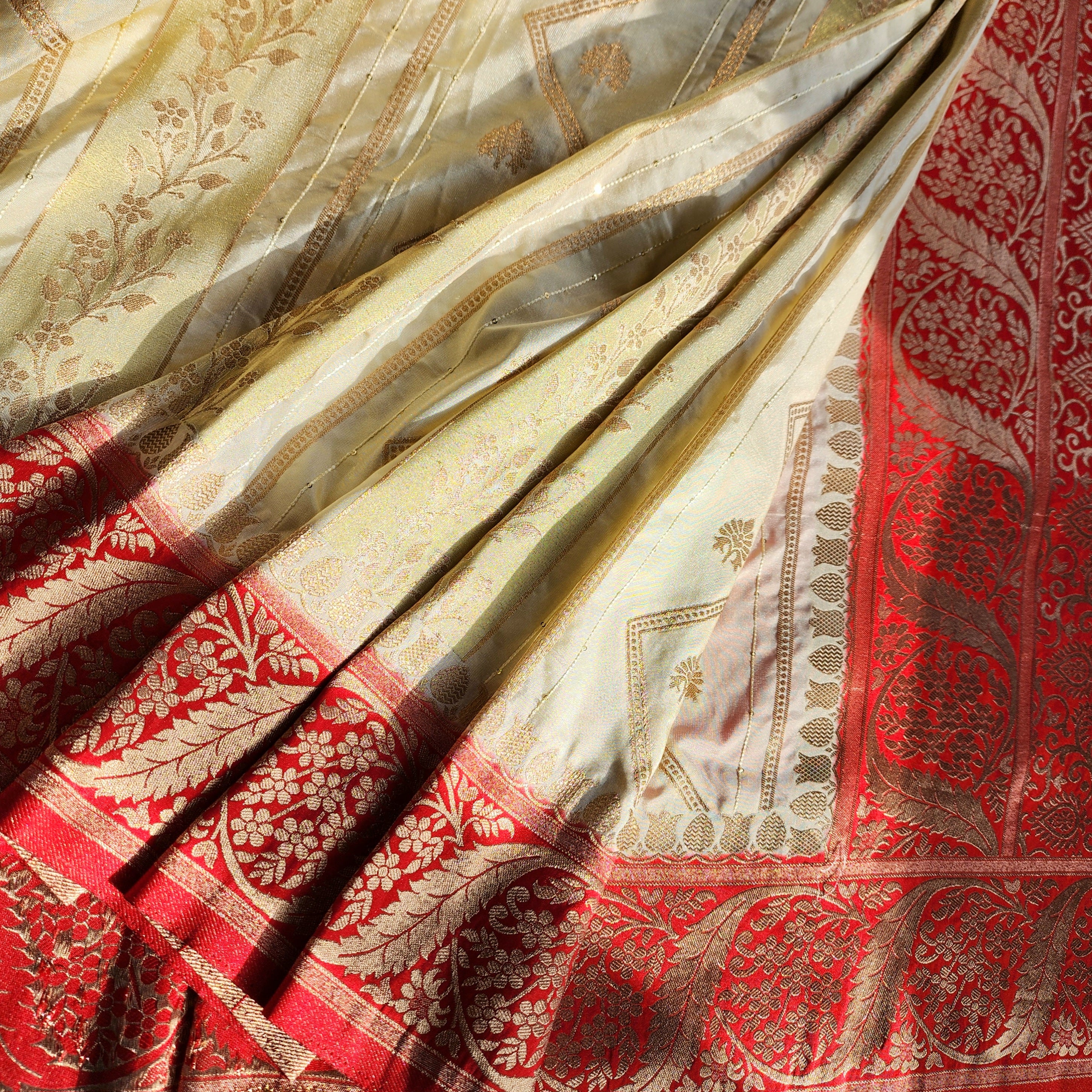 Rich White Crepe Georgette Silk Saree with Red Border and Gold Zari Detailing