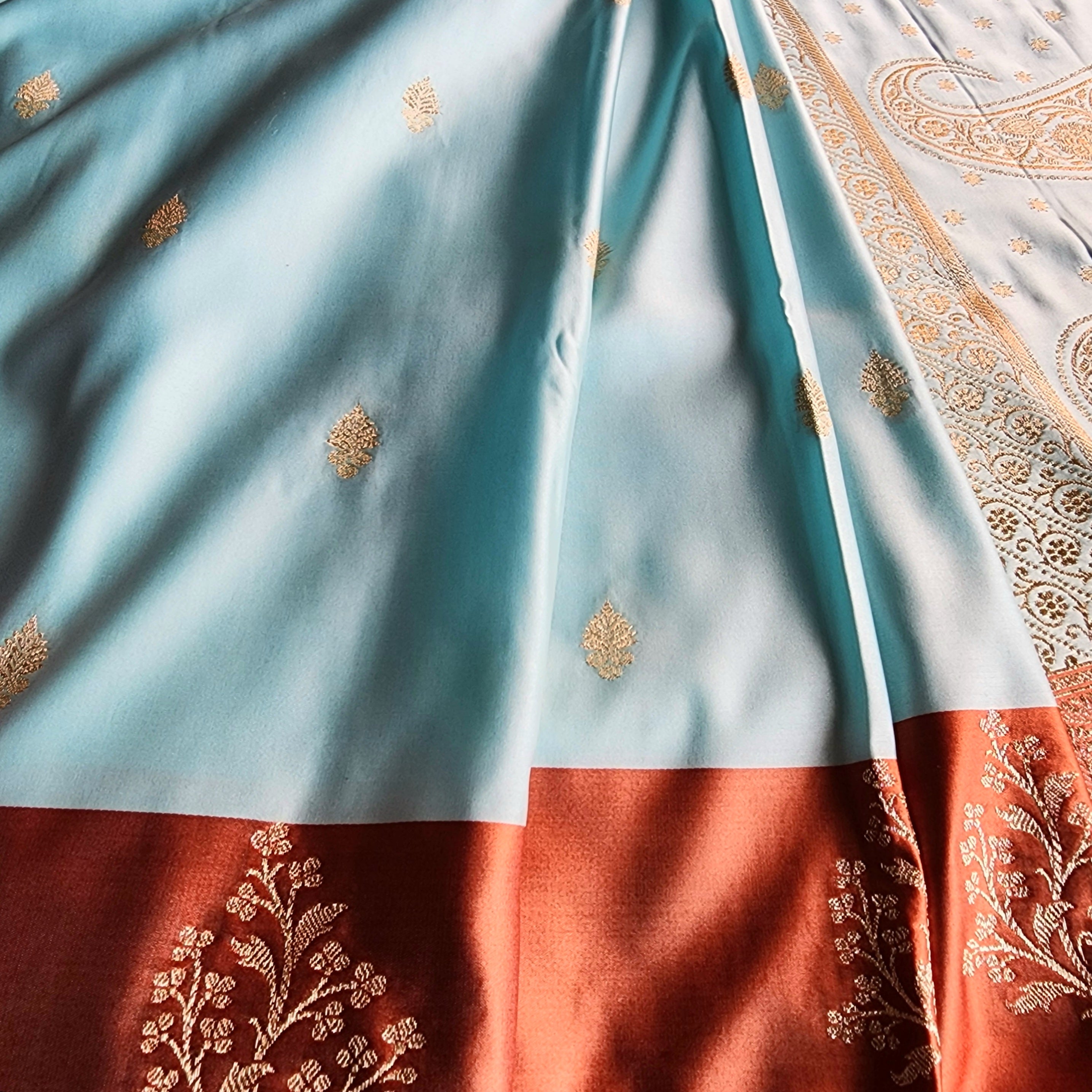 Powder Blue Katan Silk Saree with Rust Orange Gold Zari Border